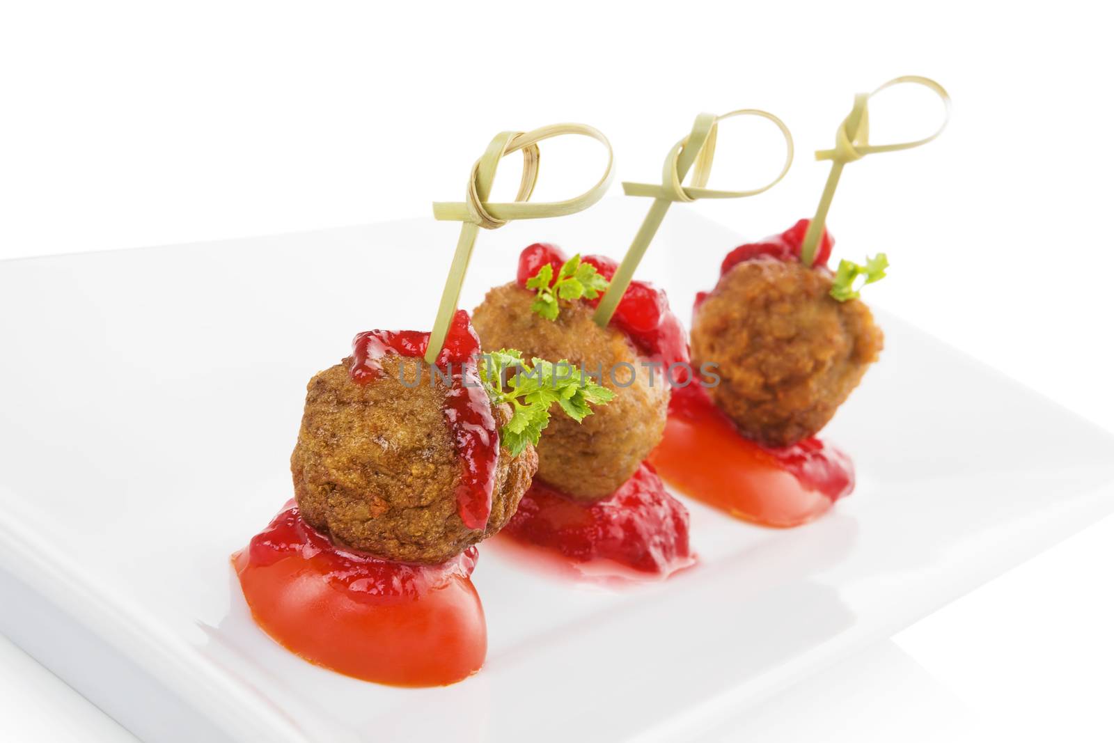 Delicious meatballs canape isolated on white background. Fresh modern image language. Culinary arts. 