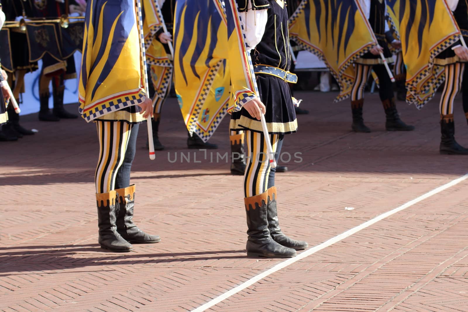 Palio, the city celebrates with competitions of the flag wavers and the parade of the districts