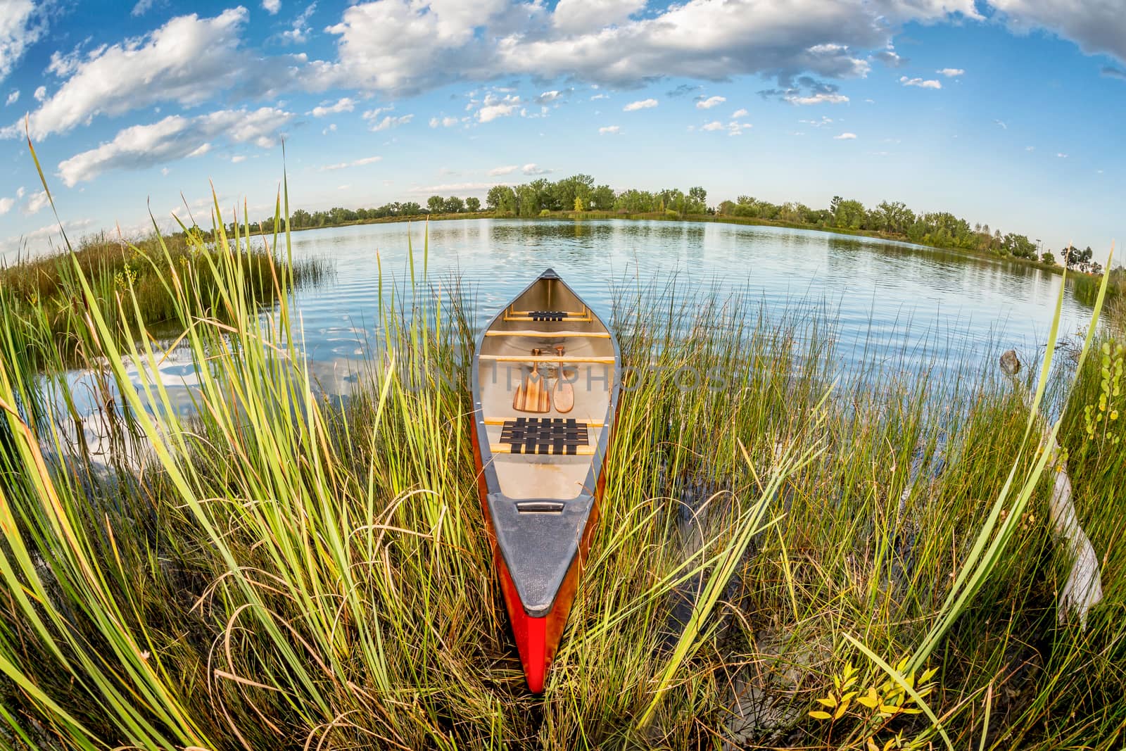 canoe in fish eye lens perspectrive by PixelsAway