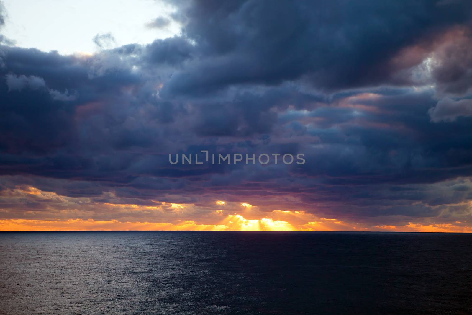 Sunset Over a Cloudy Atlantic by graficallyminded