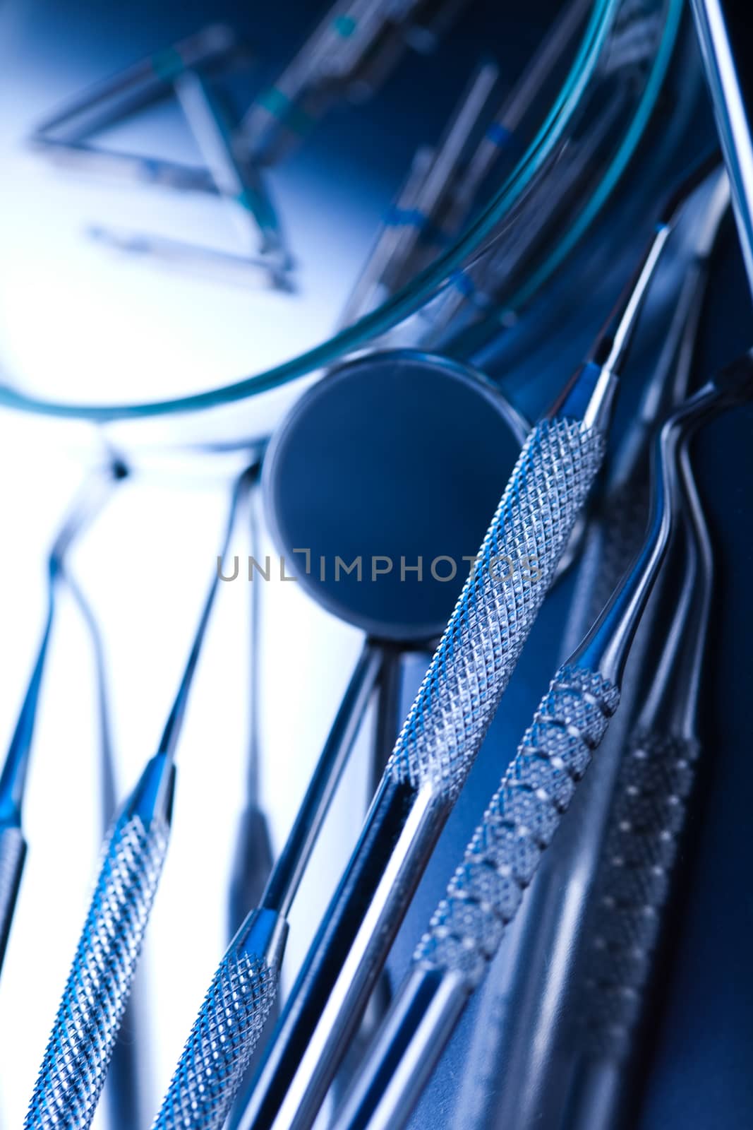 Close-up Dental Instruments, bright colorful tone concept by JanPietruszka