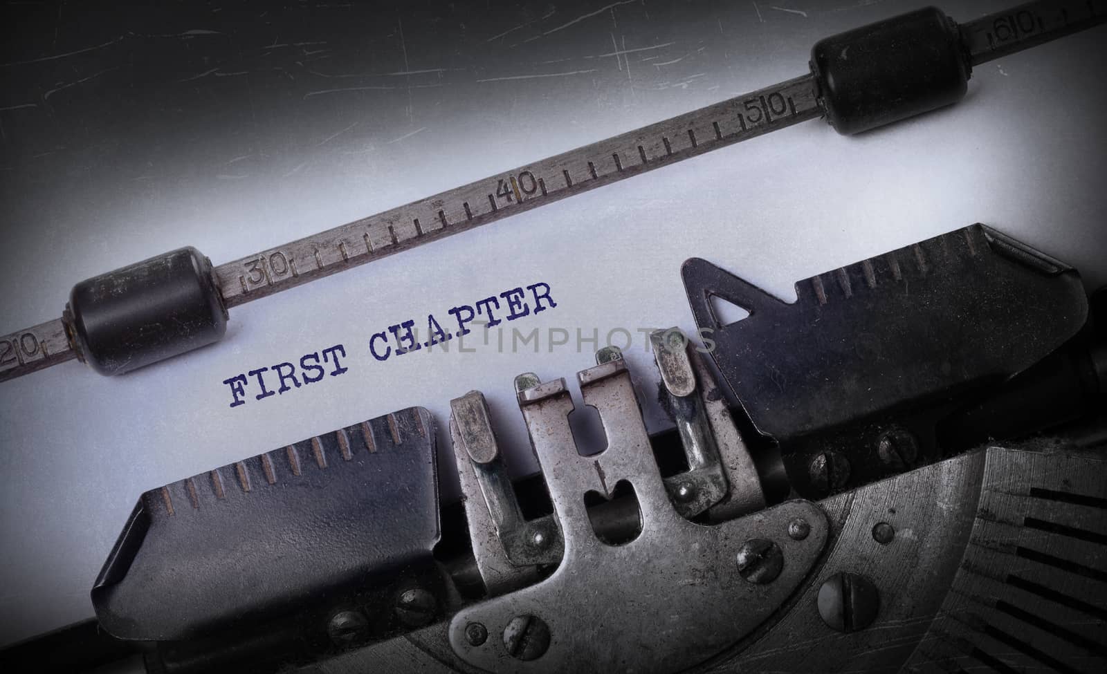 Vintage inscription made by old typewriter, First chapter