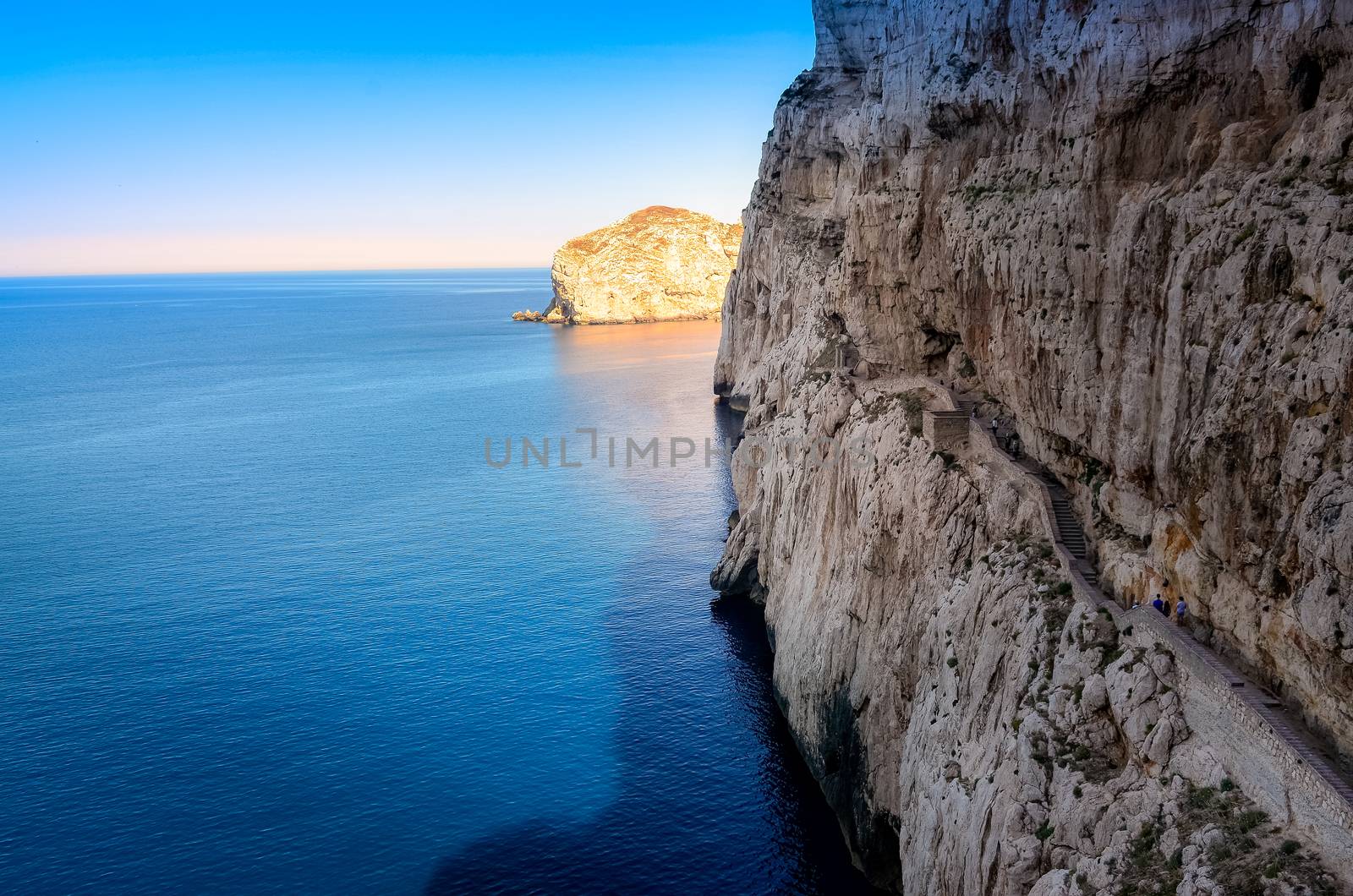 Ocean landscape view of cliffs near Neptune's cave, Sardinia, Italy