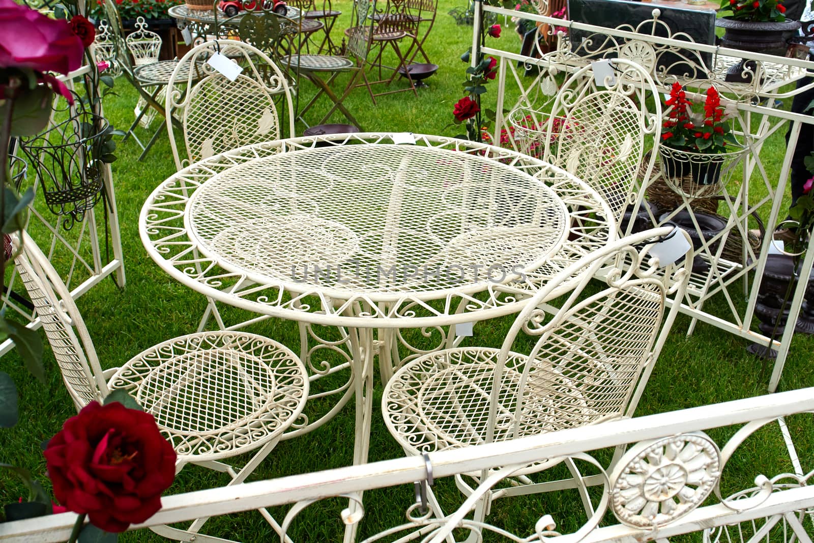 Classical design garden furniture painted in white                
