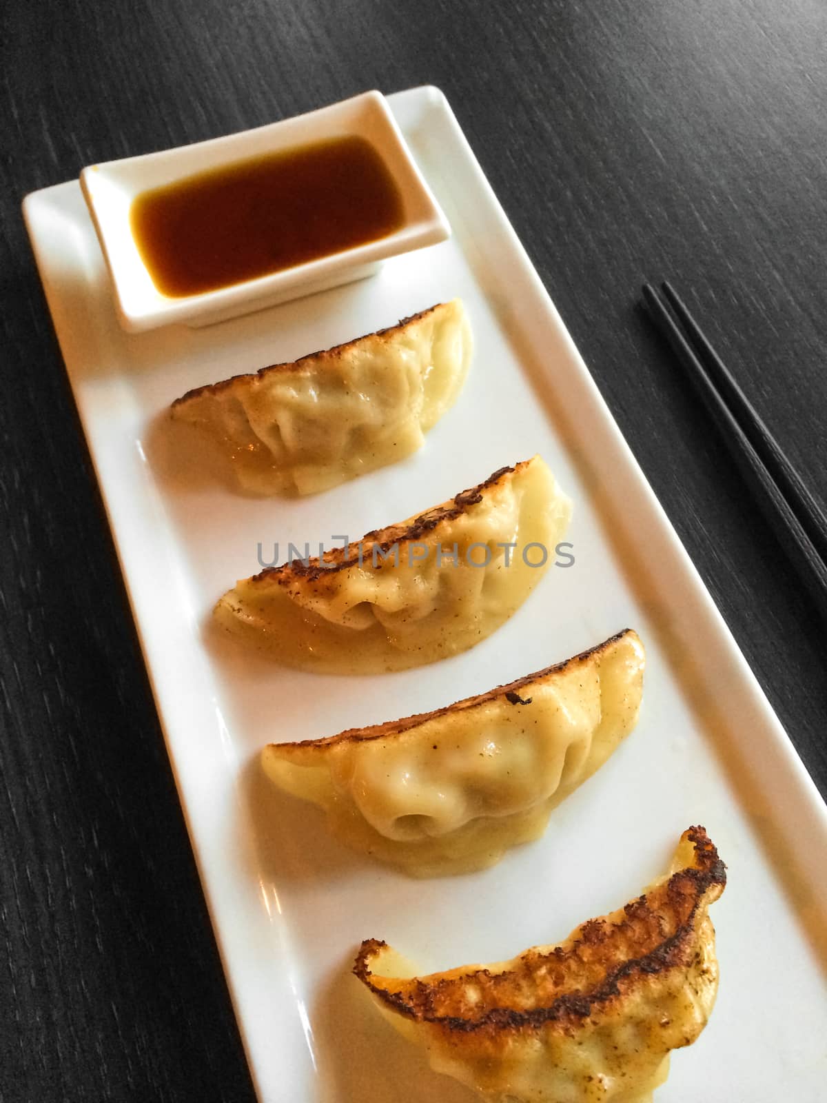 Japanese tapas, traditional cuisine. Pan-fried dumplings.