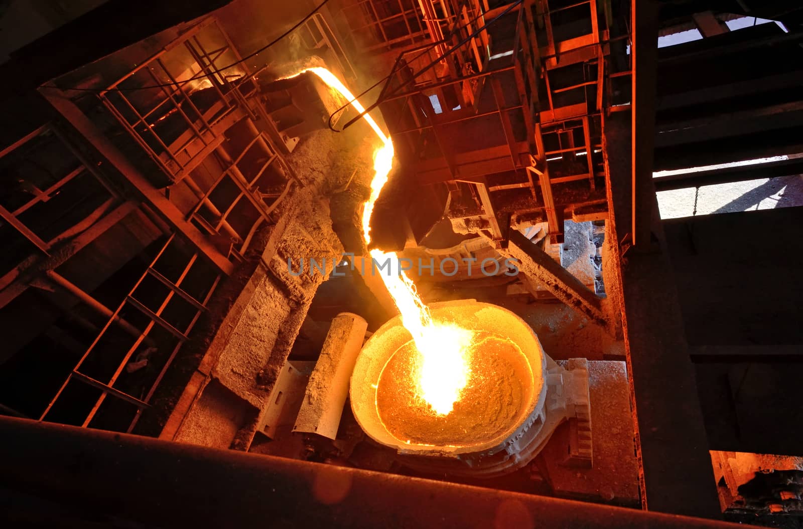 Liquid metal from blast furnace on trail