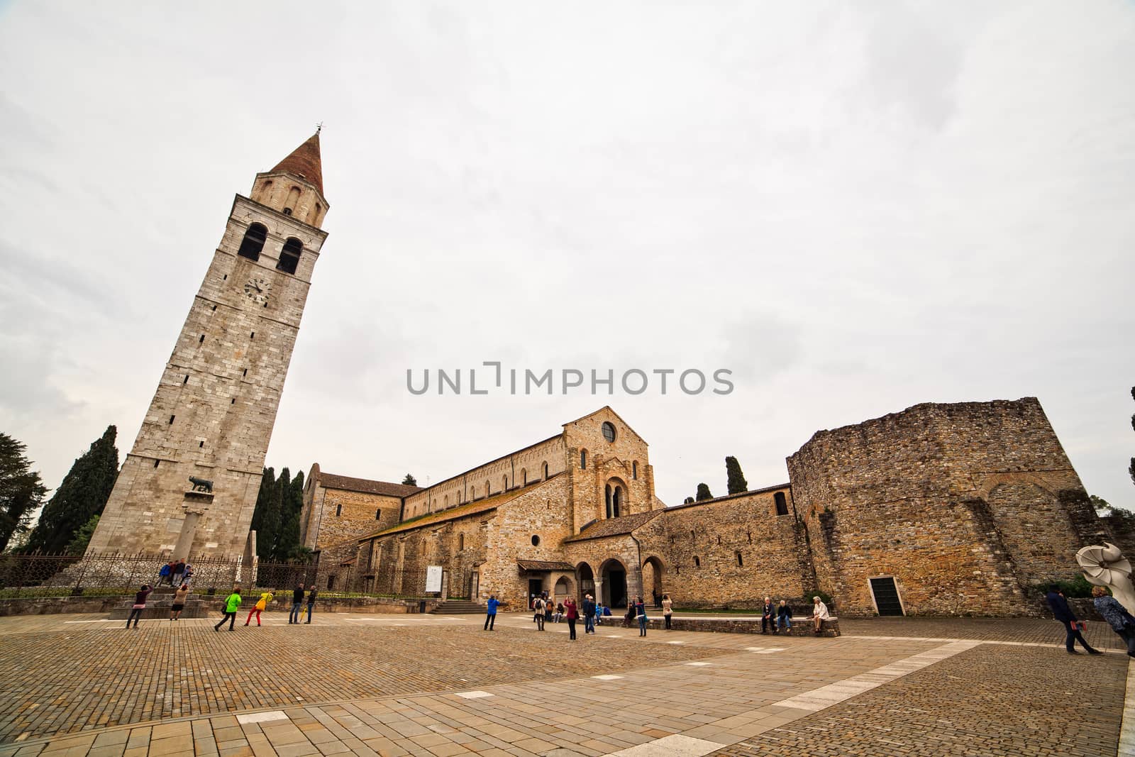 View of Basilica di Santa Maria Assunta and bell tower of Aquileia, Italy. Aquileia is UNESCO World Heritage Site
