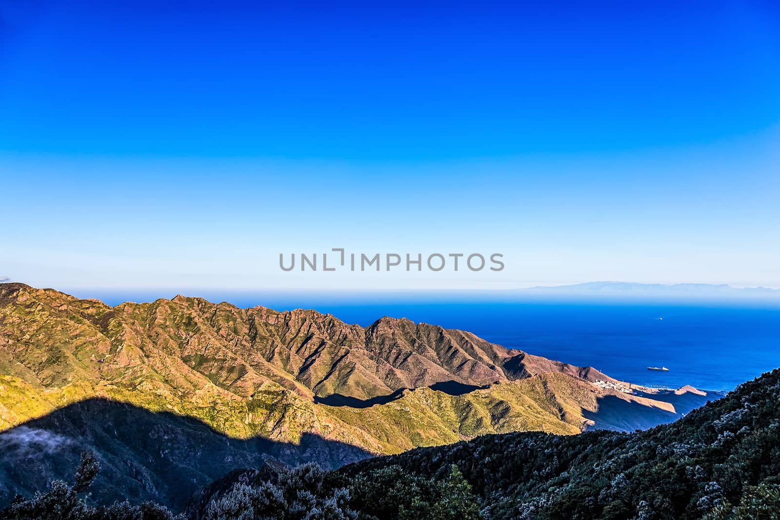 Coast or shore of Atlantic ocean with  mountain or rock and  sky with skyline in Tenerife Canary island, Spain at spring or summer