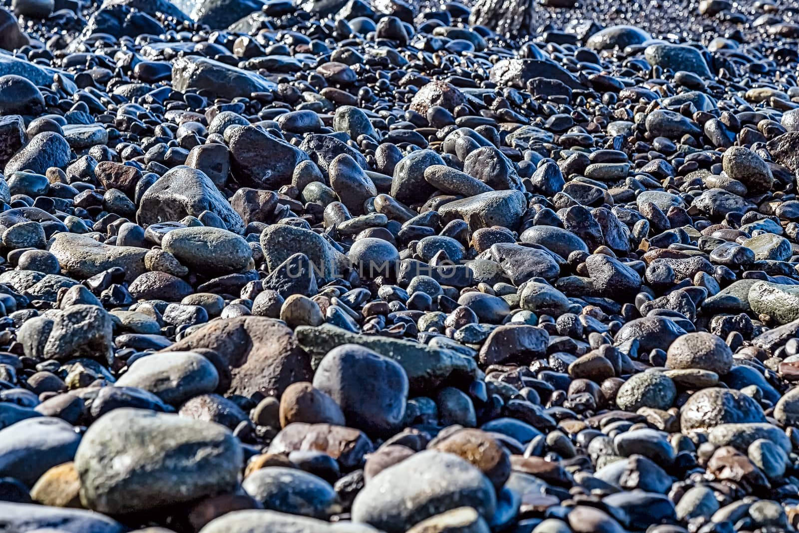 Stones on the beach coast or shore of ocean or sea