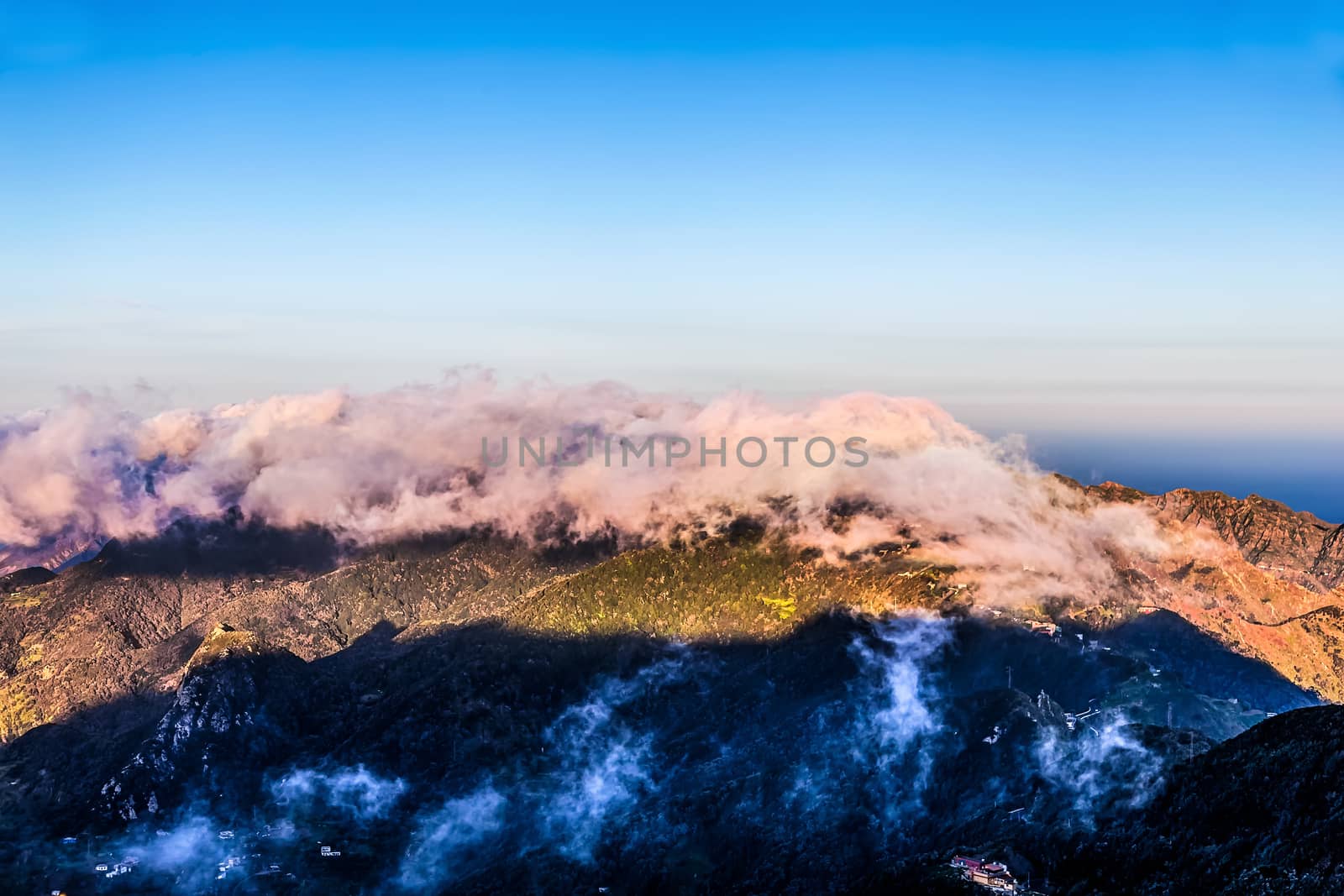 Mountains with clouds on blue sky landscape in Tenerife Canary island, Spain at sunset