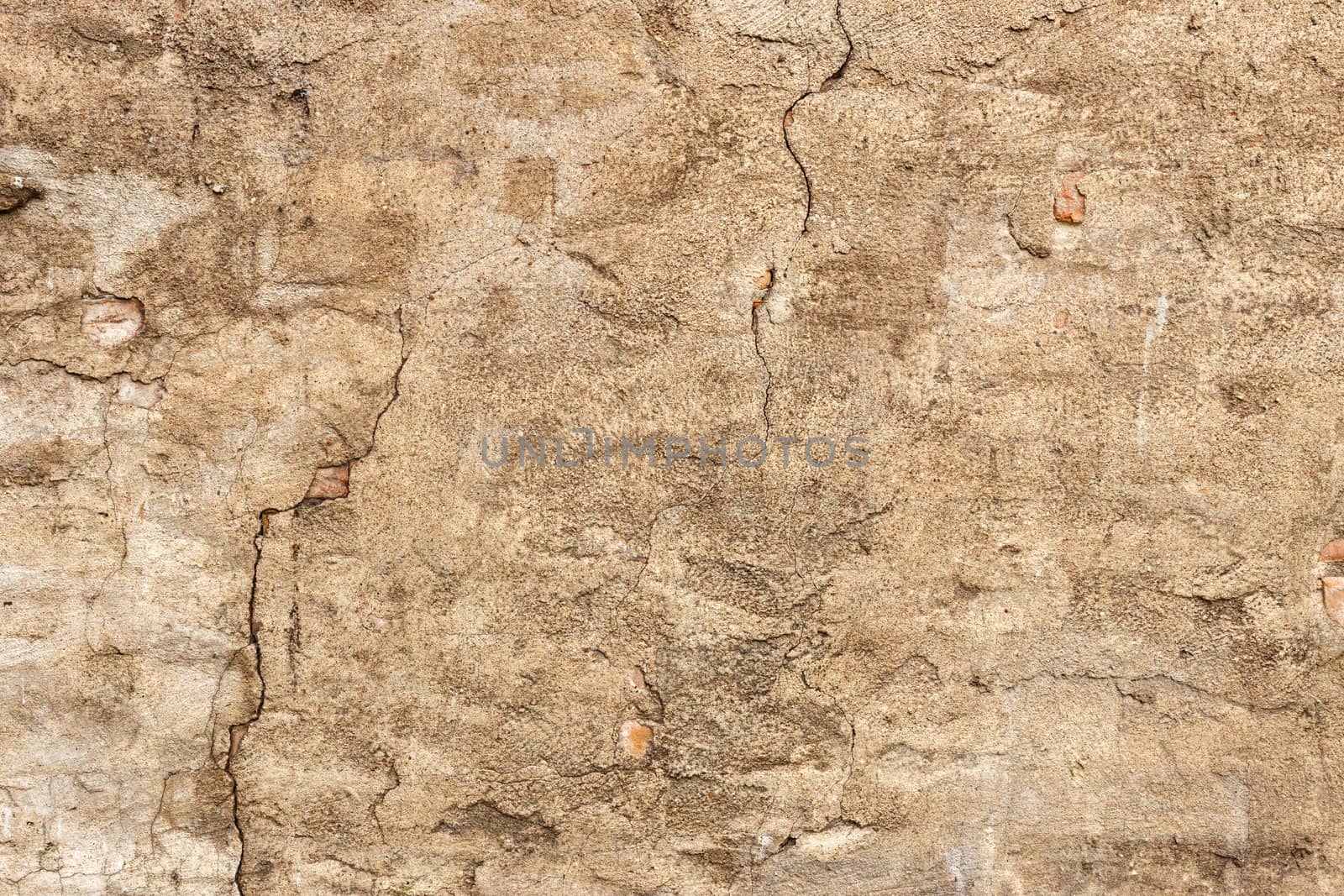 Brick wall background,texture concrete plaster on a brick wall