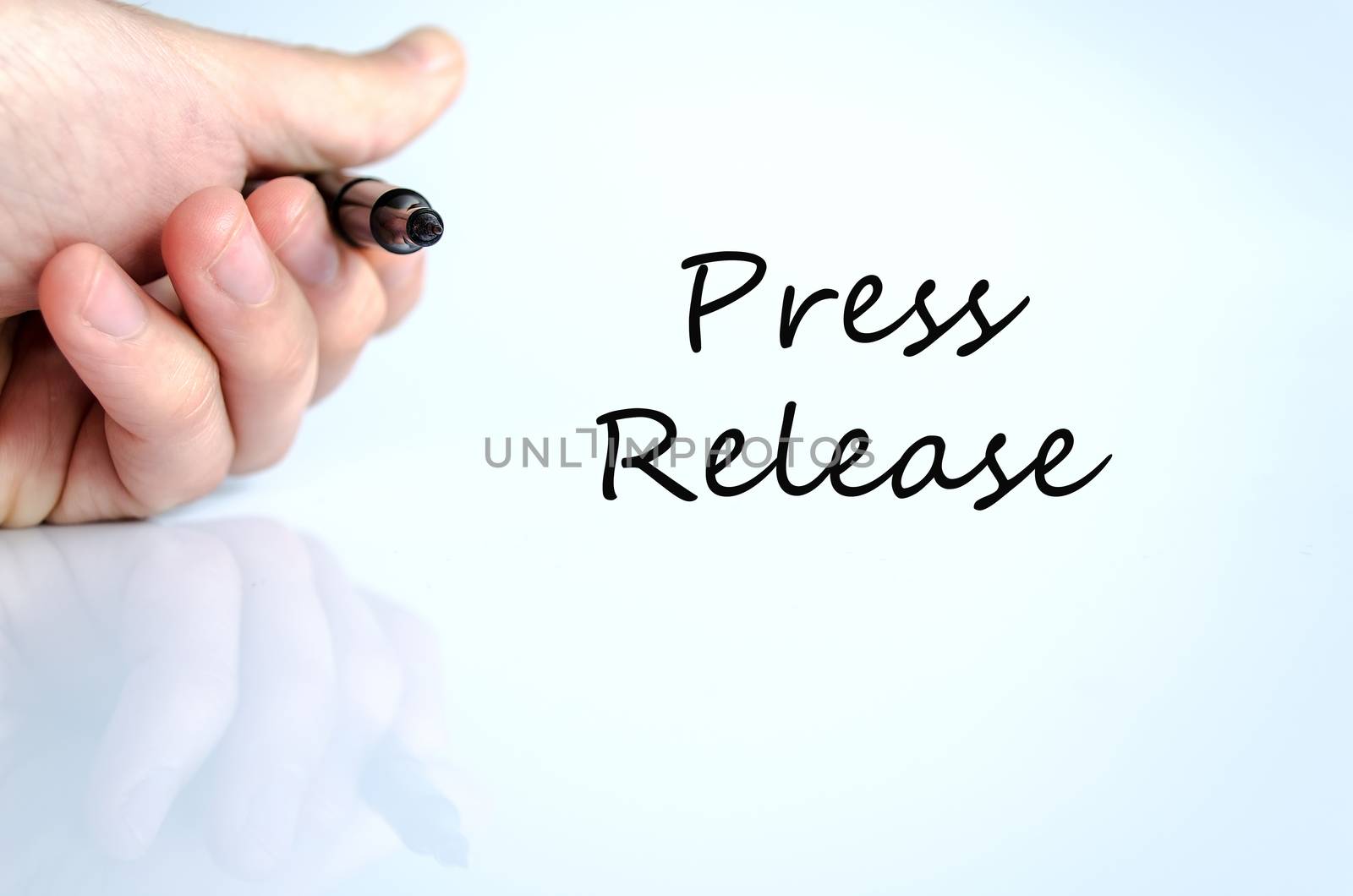 Pen in the hand isolated over white background press release