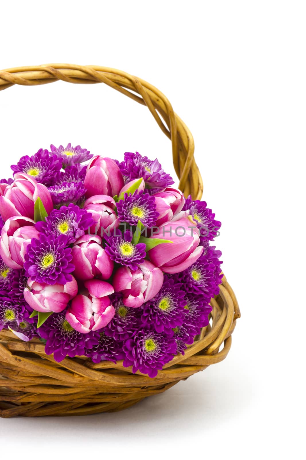 Bouquet made of tulips and chrysanthemum flowers on white background