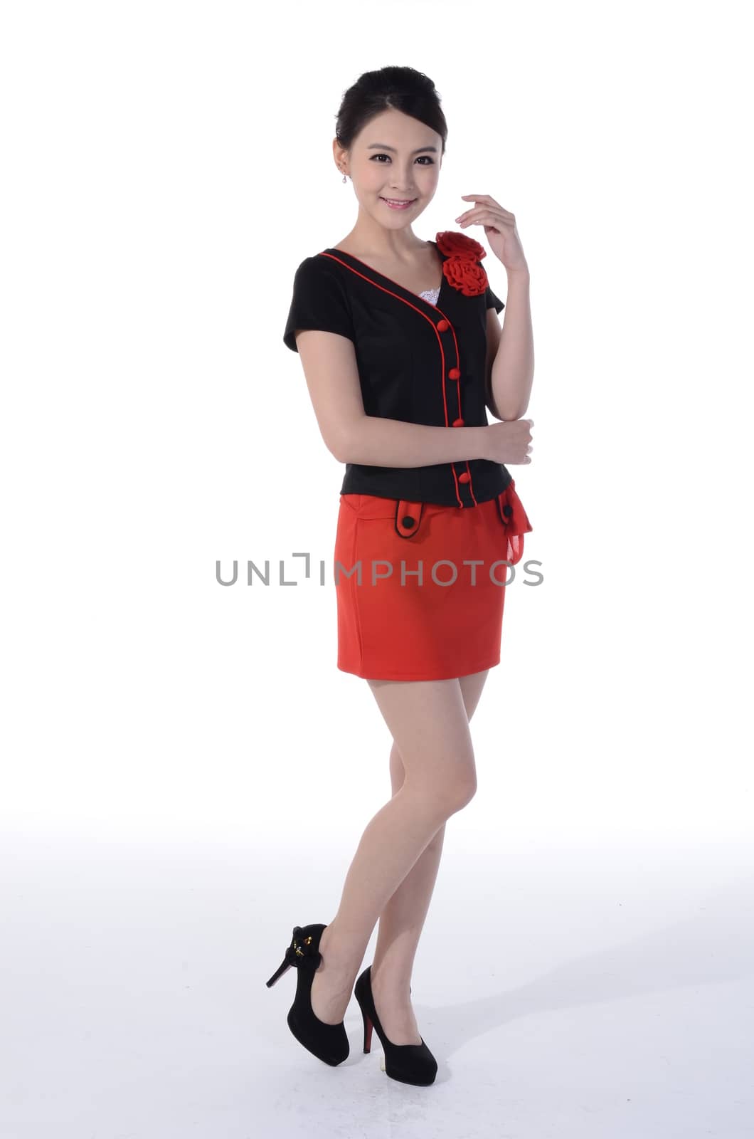 Active girl wear professional attire in front of a white background by quweichang