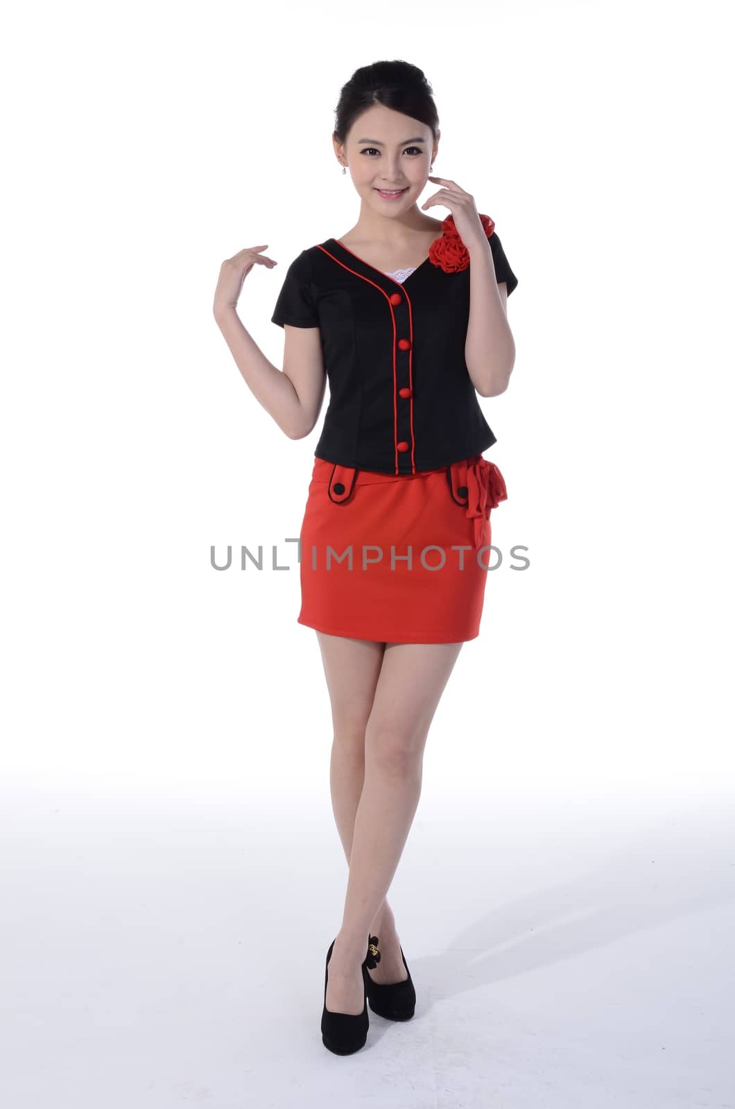 Active girl wear professional attire in front of a white background by quweichang