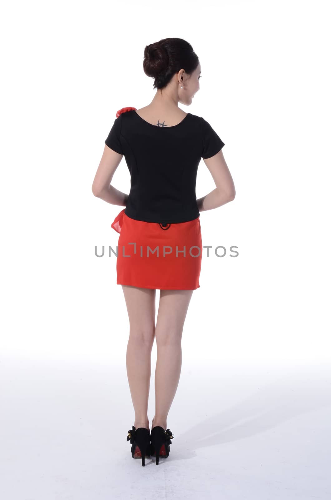 Active girl wear professional attire in front of a white background by quweichang