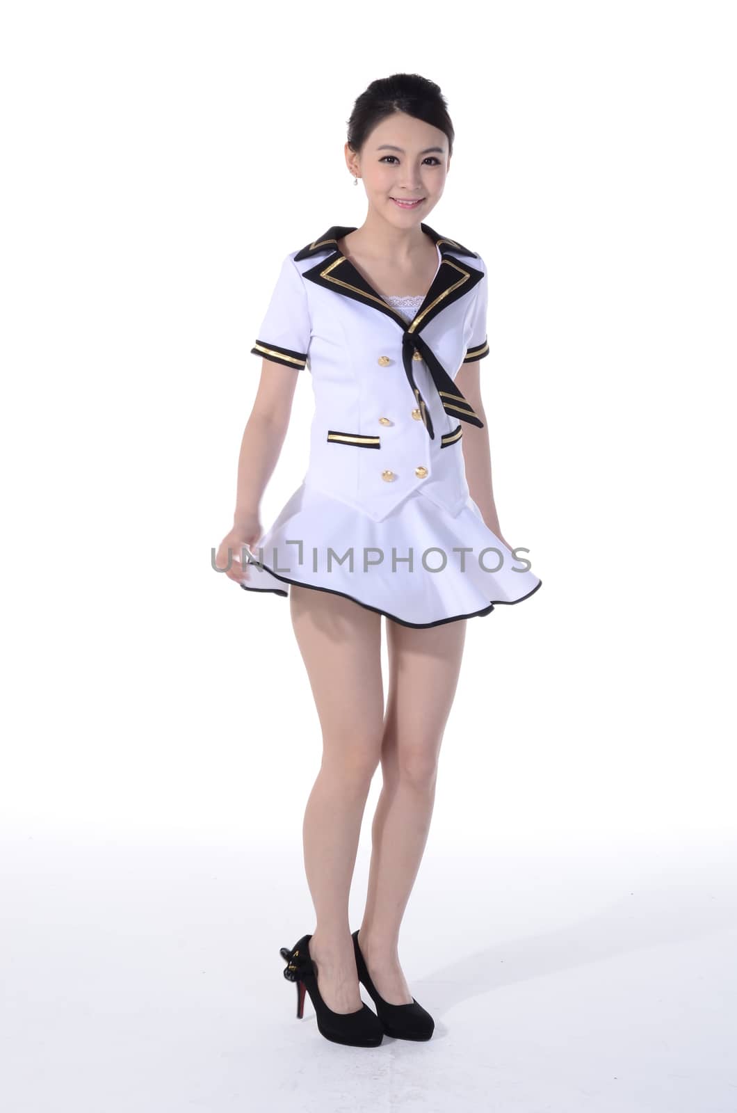 Active girl wear professional attire in front of a white background