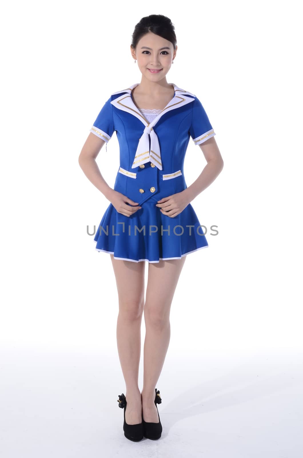 Active girl wear professional attire in front of a white background