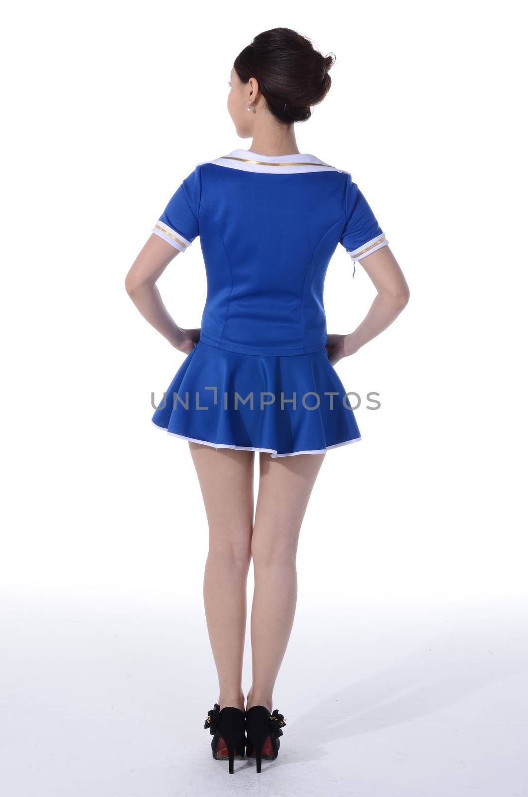 Active girl wear professional attire in front of a white background