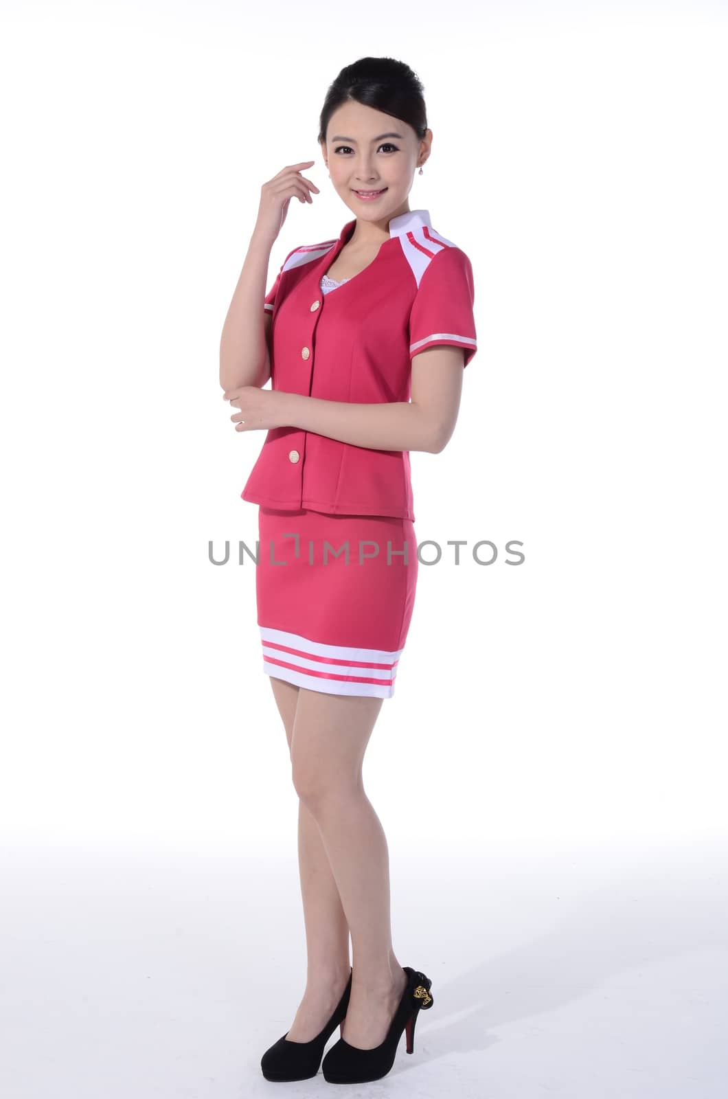 Active girl wear professional attire in front of a white background