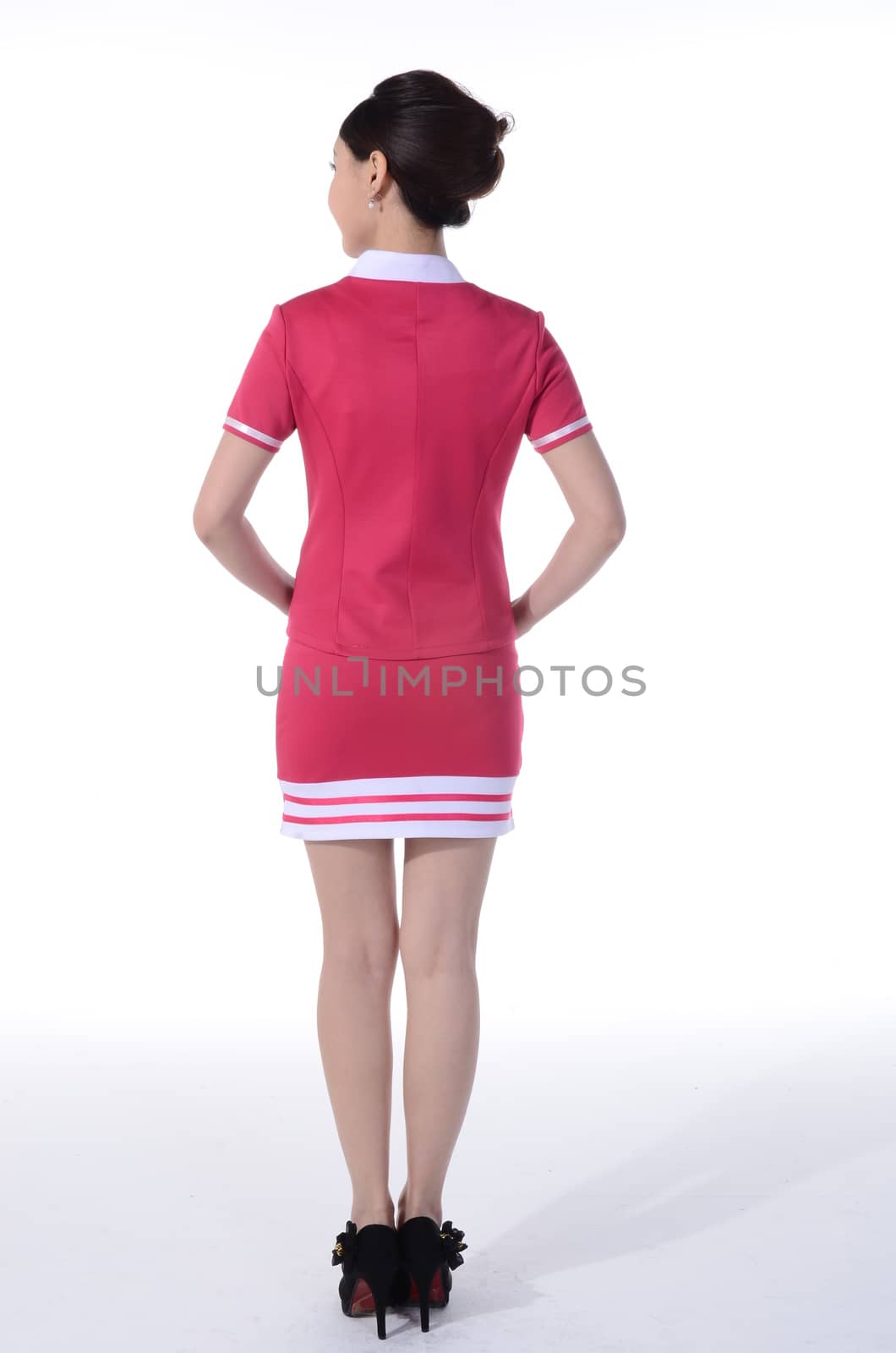 Active girl wear professional attire in front of a white background by quweichang