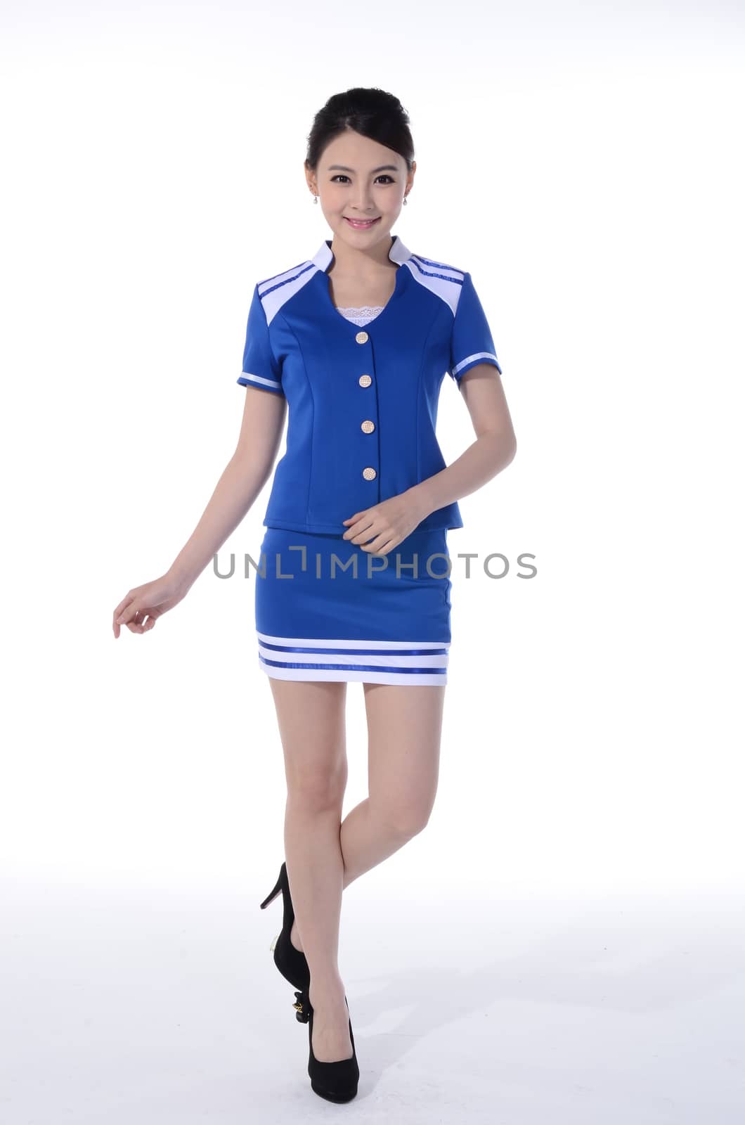 Active girl wear professional attire in front of a white background