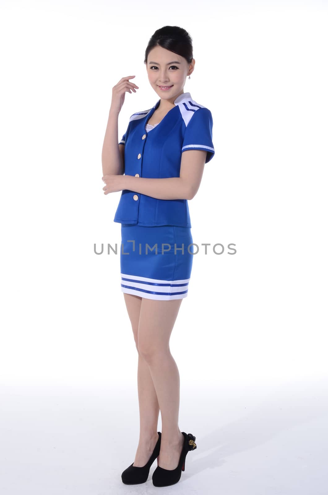 Active girl wear professional attire in front of a white background