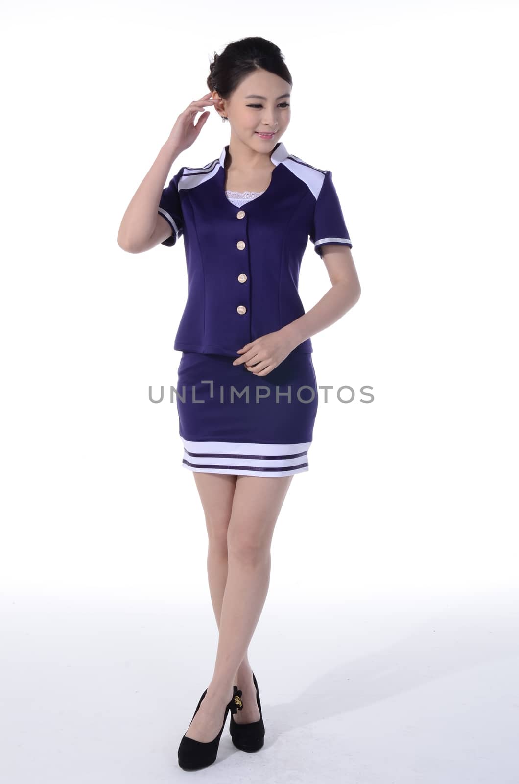 Active girl wear professional attire in front of a white background by quweichang