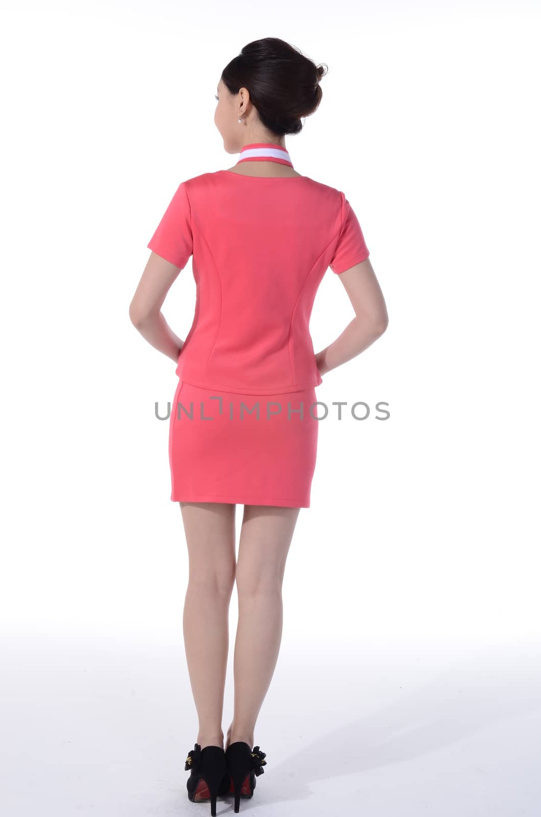 Active girl wear professional attire in front of a white background by quweichang