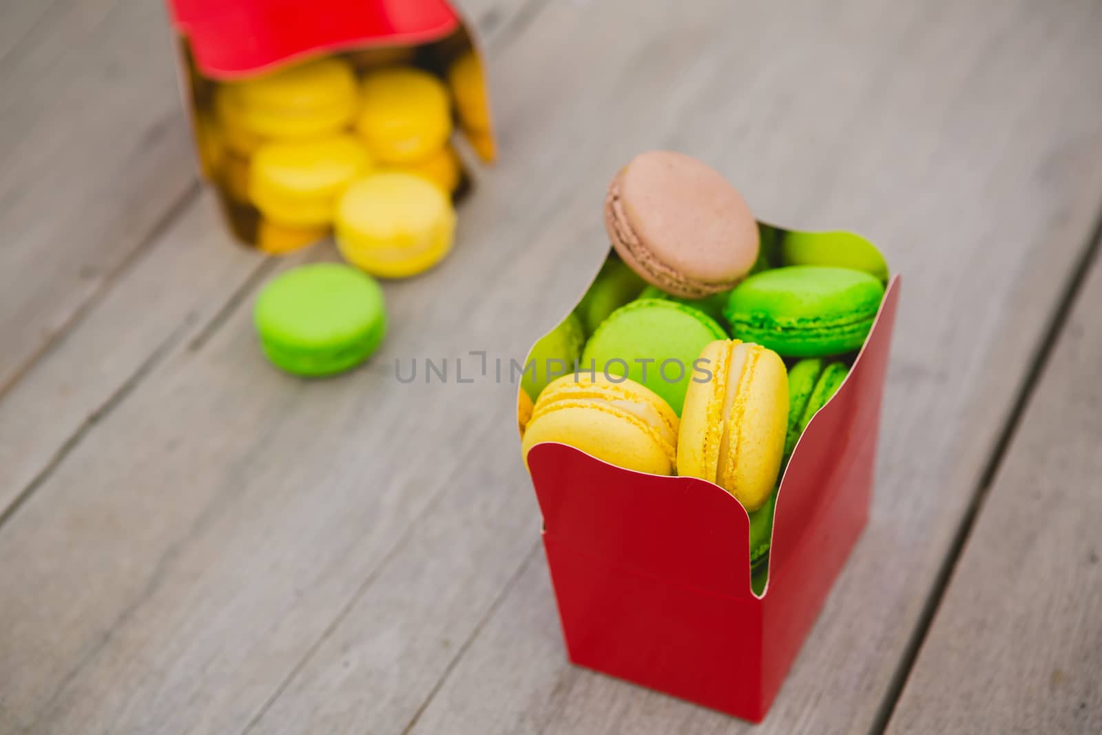 A lot of french colorful macarons. shallow dof