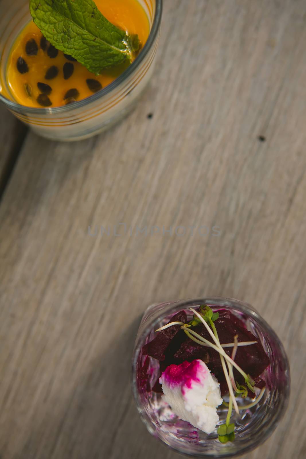 Vegetarian aperitif with beet, goat cheese and soy sprouts