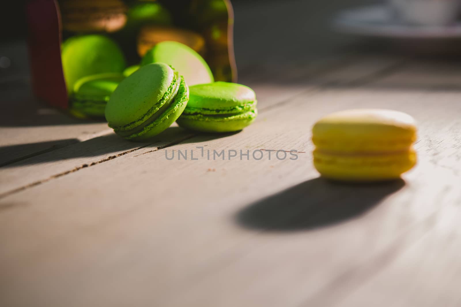 A lot of french colorful macarons. shallow dof