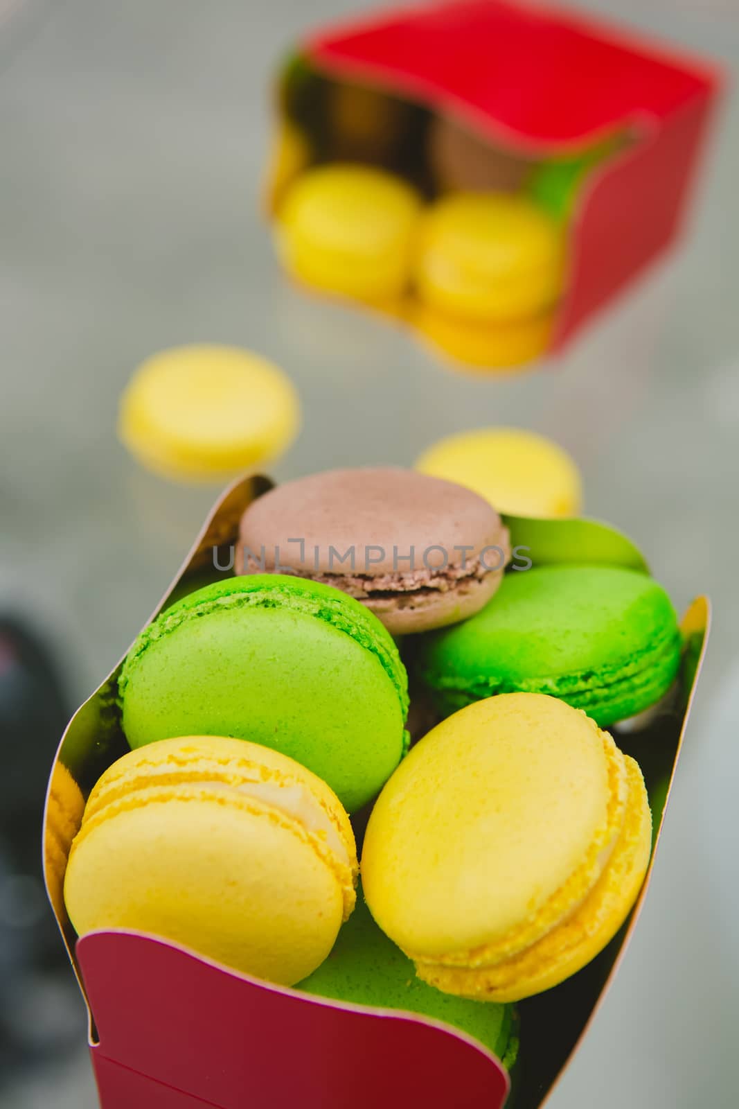 A lot of french colorful macarons. shallow dof