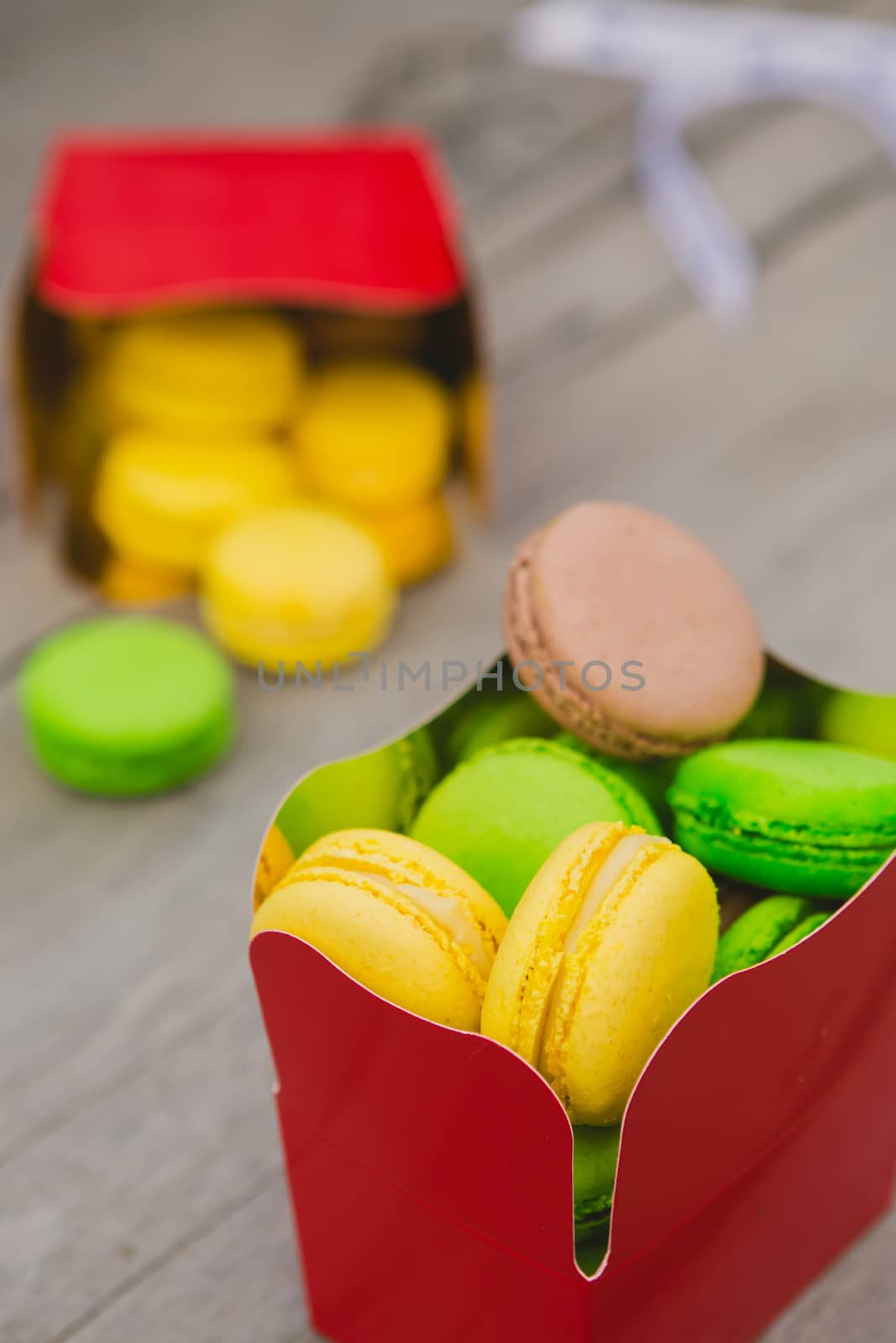 A lot of french colorful macarons. shallow dof