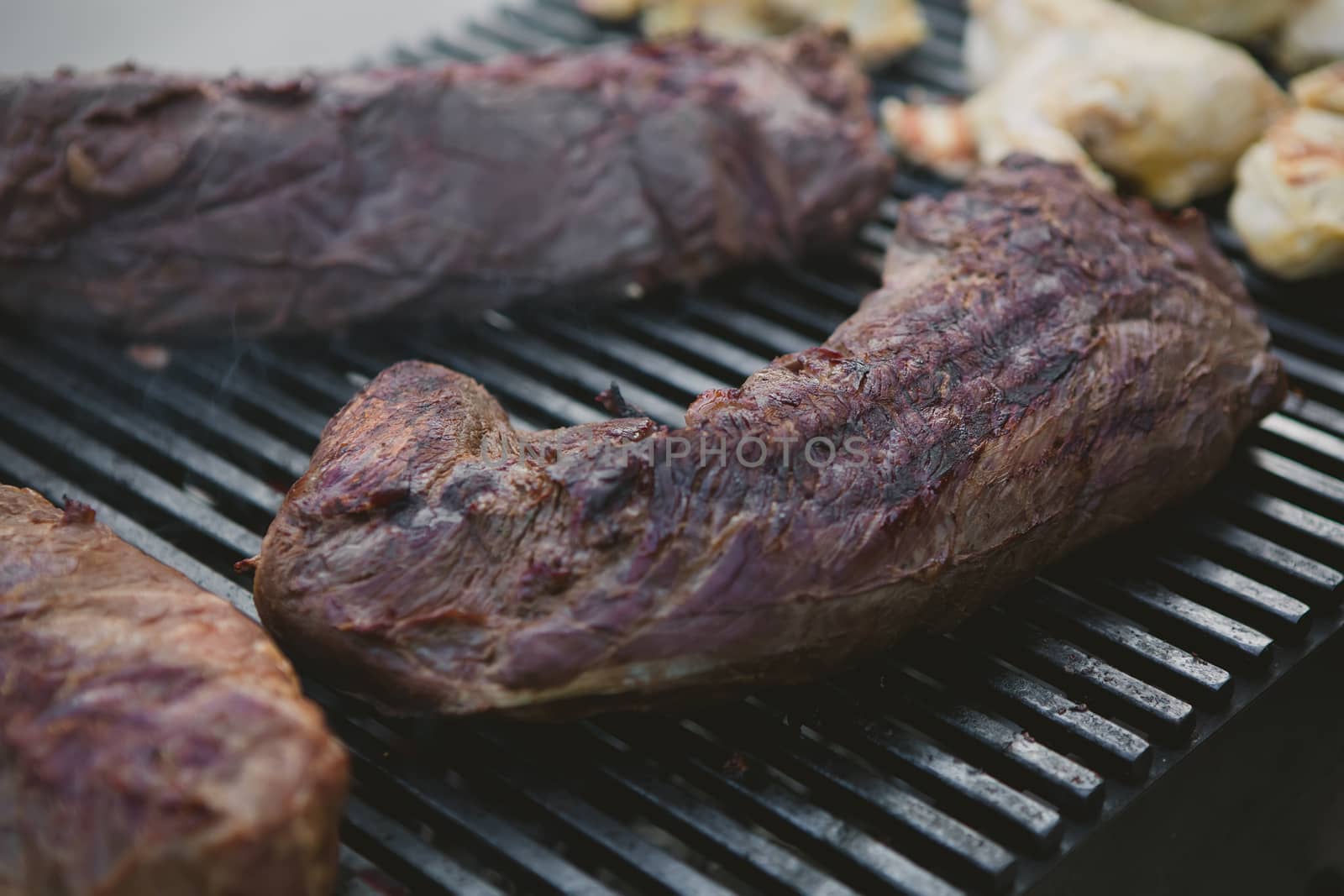 organic beef on the grill. close-up. Shallow DOF.