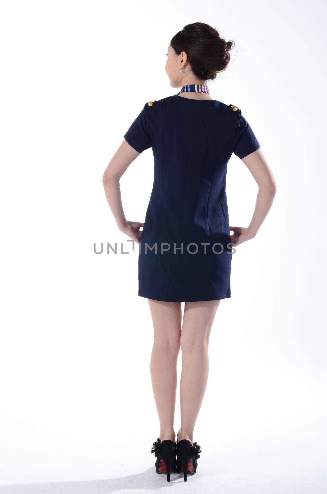 Active girl wear professional attire in front of a white background