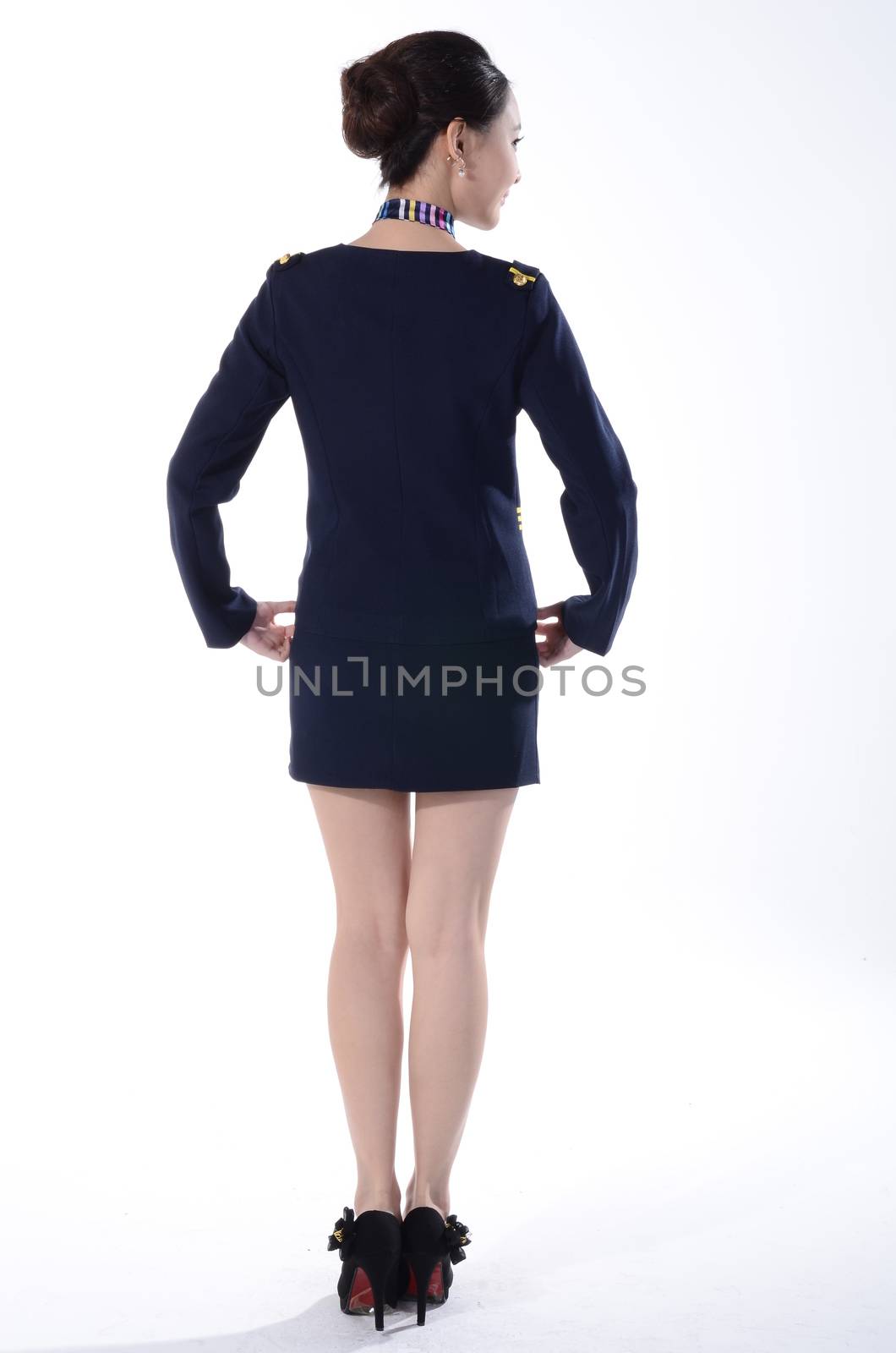 Active girl wear professional attire in front of a white background by quweichang