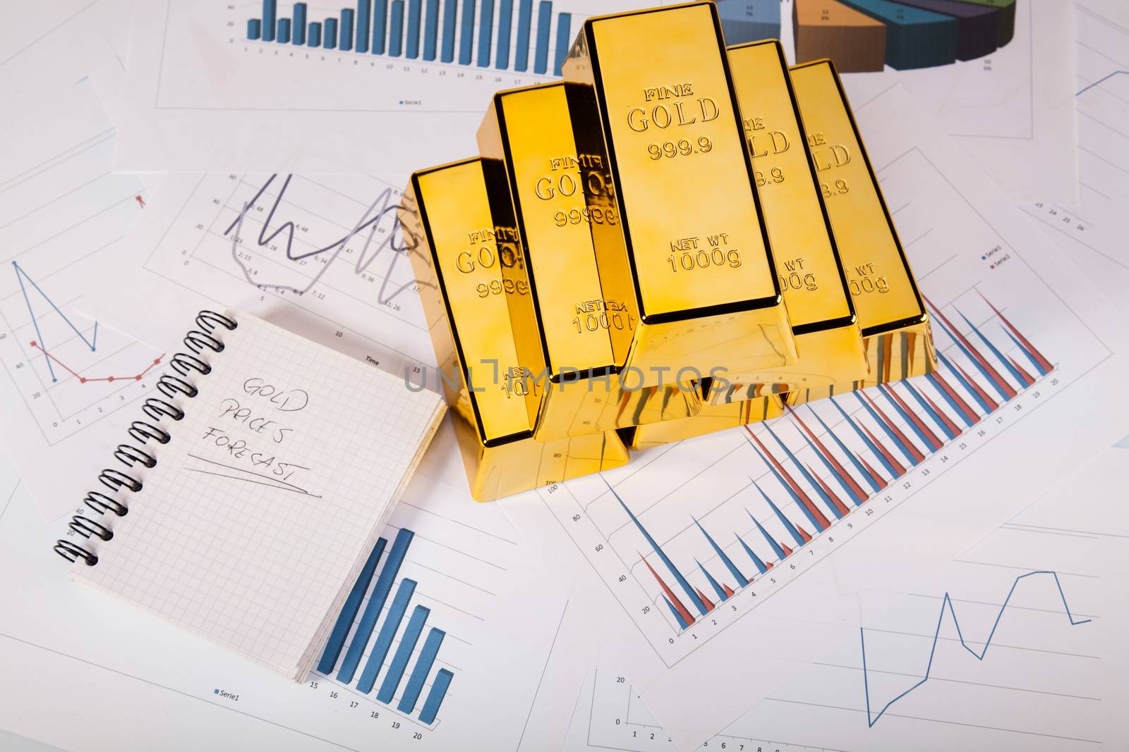 Gold bars and coins, ambient financial concept