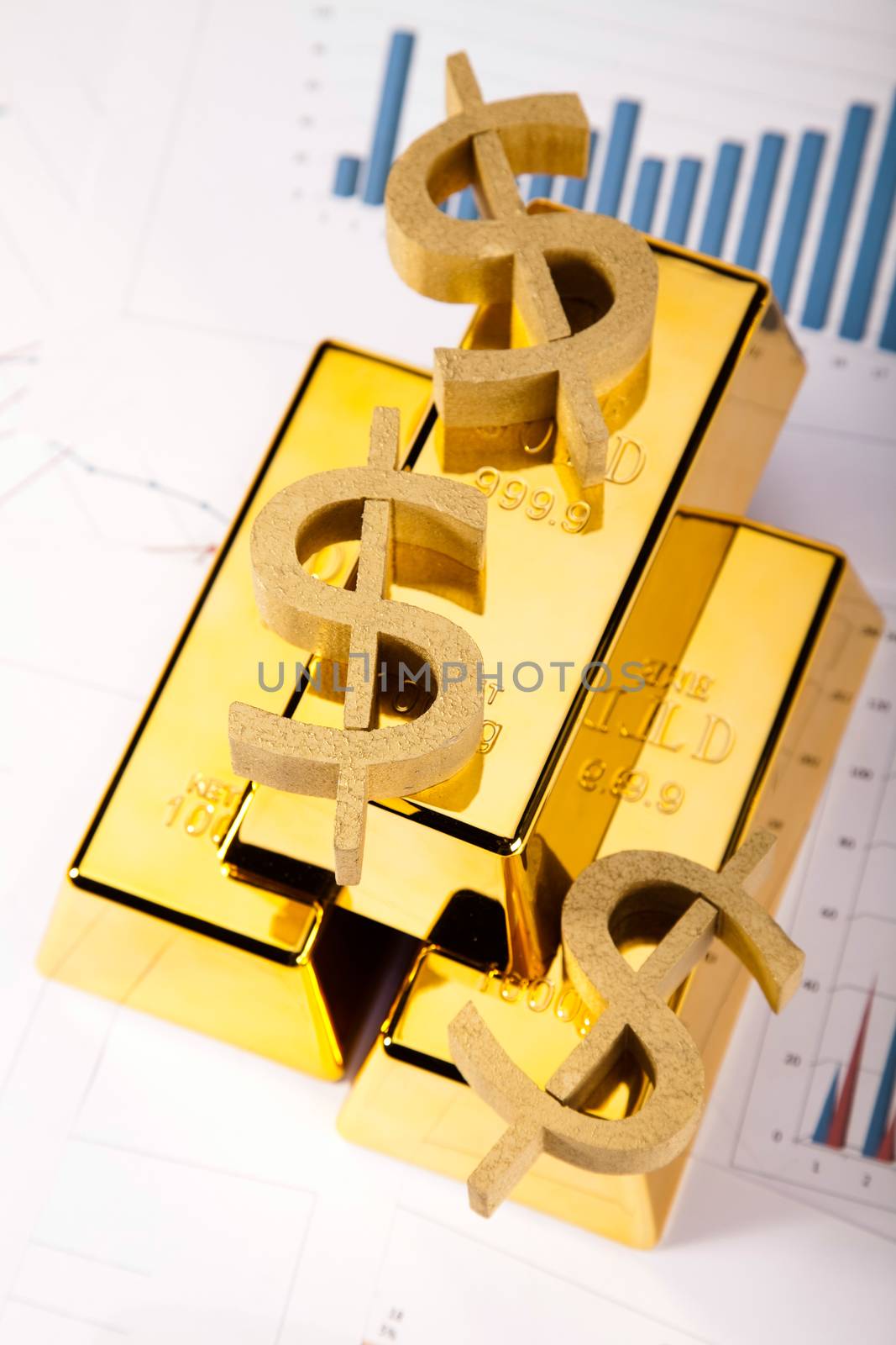 Gold bars with a linear graph, ambient financial concept