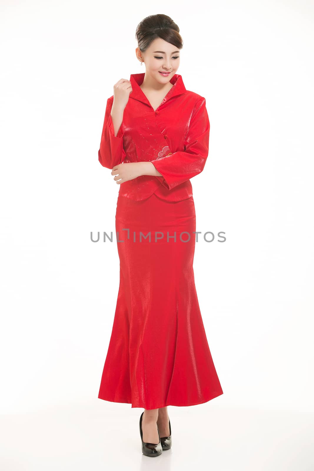 Wearing Chinese clothing waiter in front of a white background
