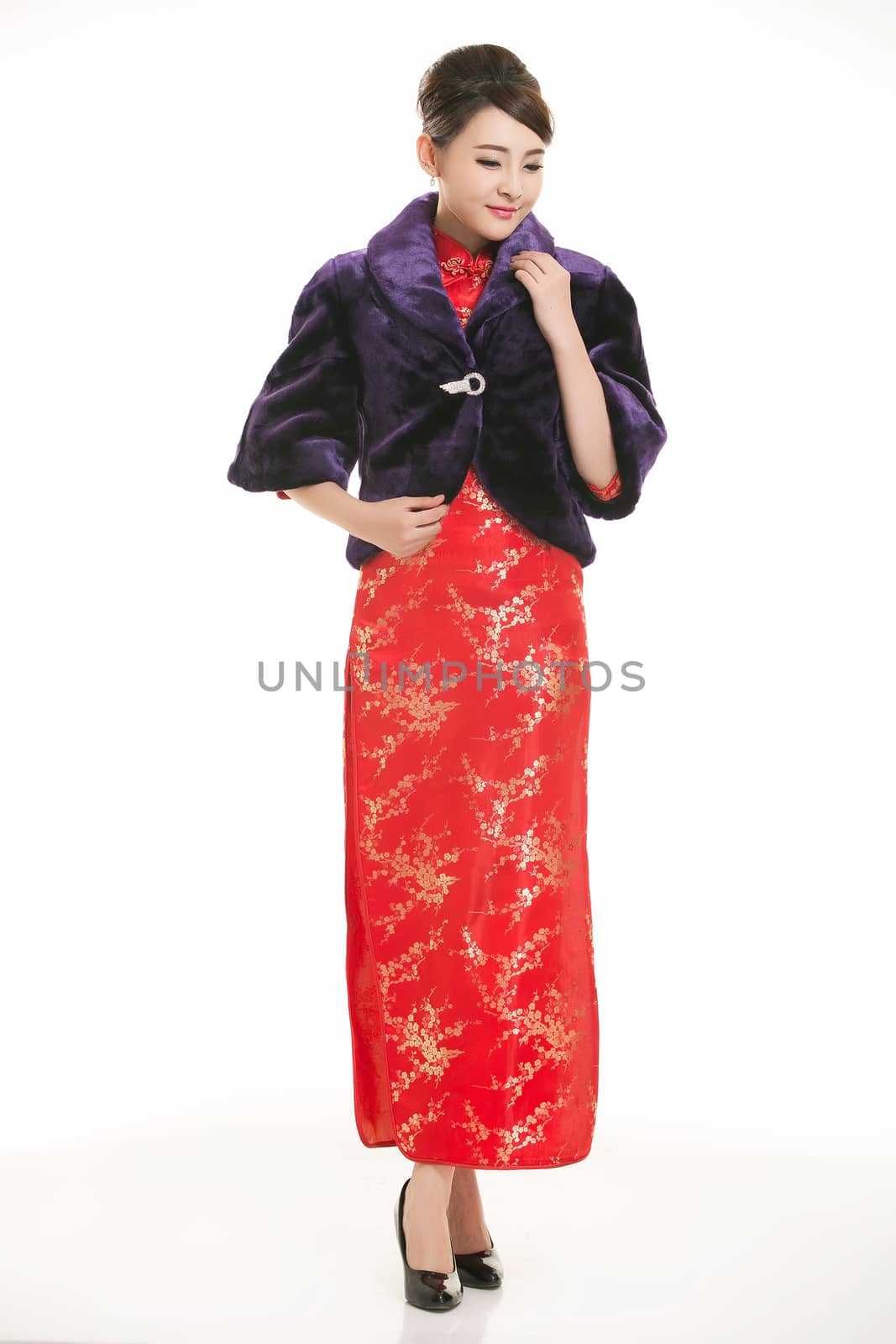 Wearing Chinese clothing waiter in front of a white background