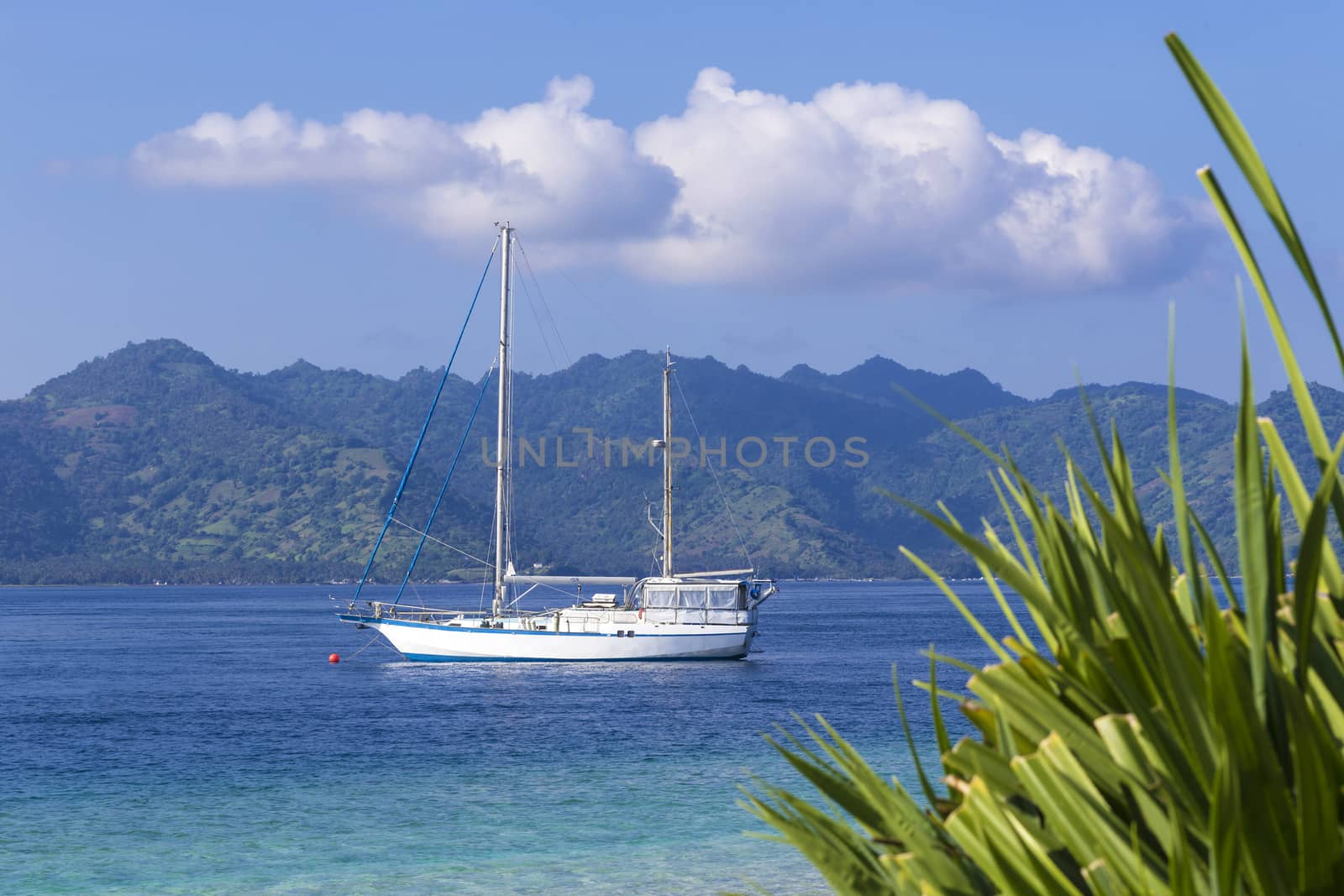 Boat at Paradise Tropic Island.  by truphoto