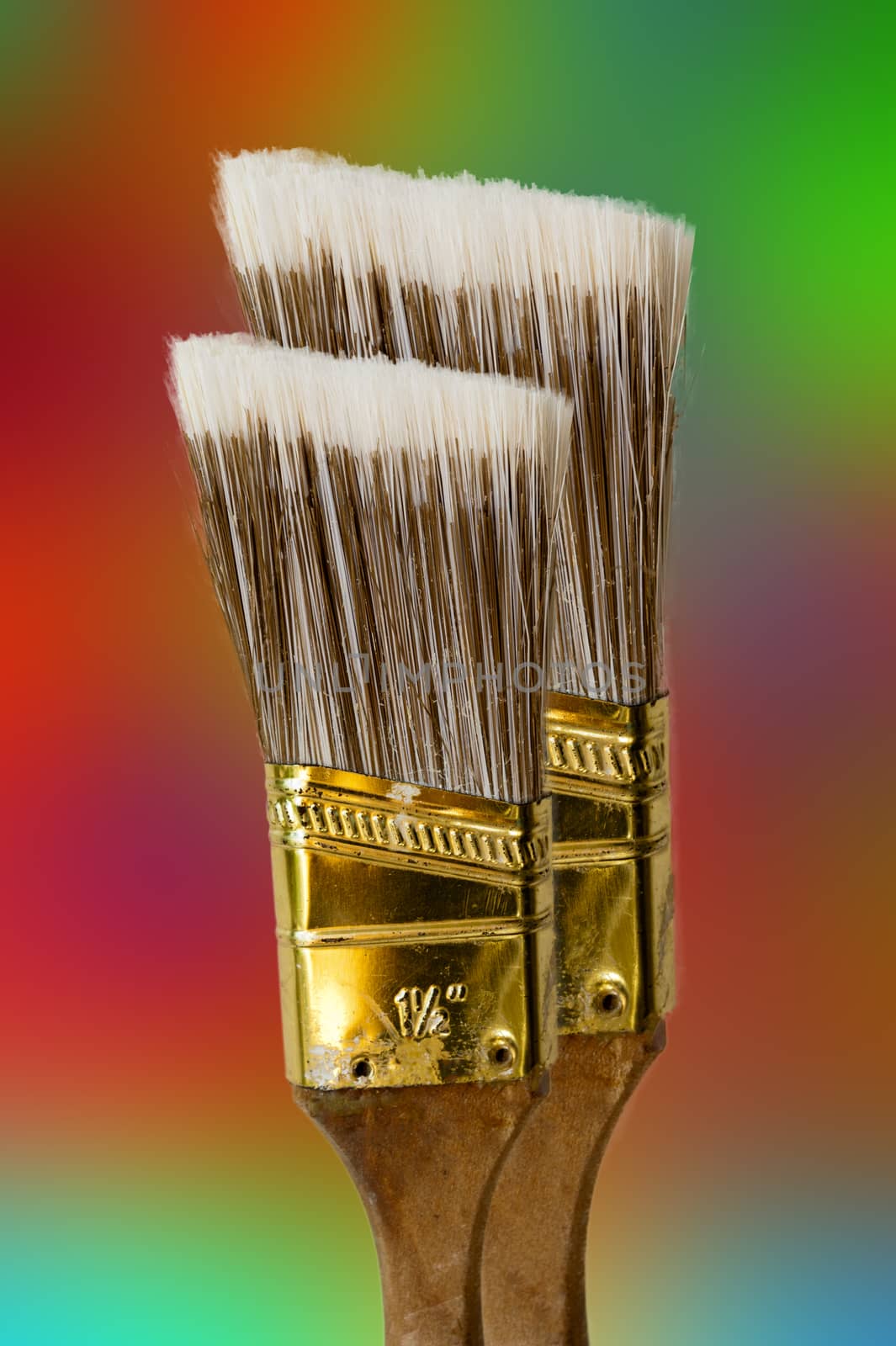Two brushes against colored background by ben44