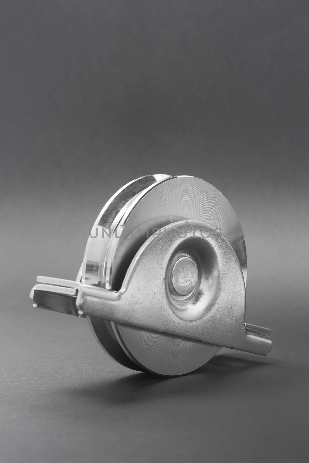 Close up of a pair of bearings used in sliding doors industrial