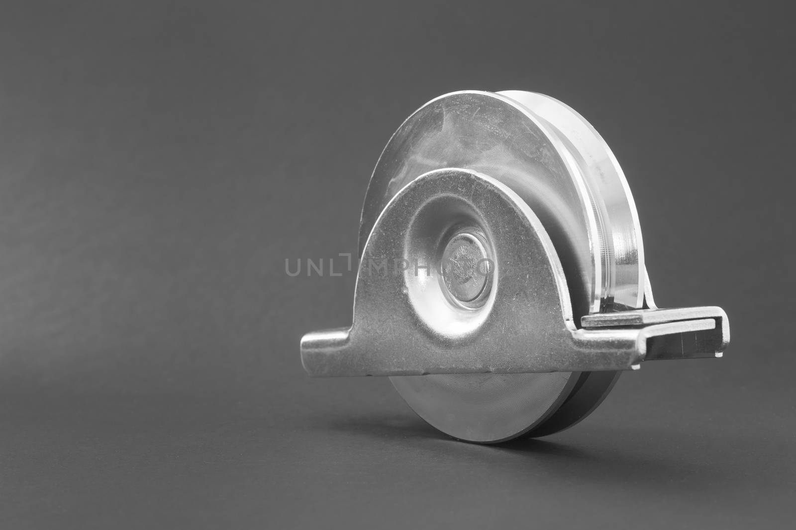 Close up of a pair of bearings used in sliding doors industrial