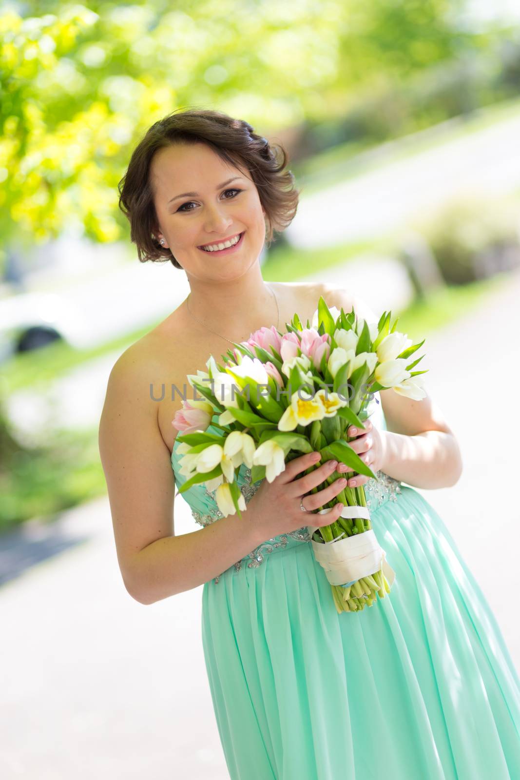 Happy bride with wedding bouquet. by kasto