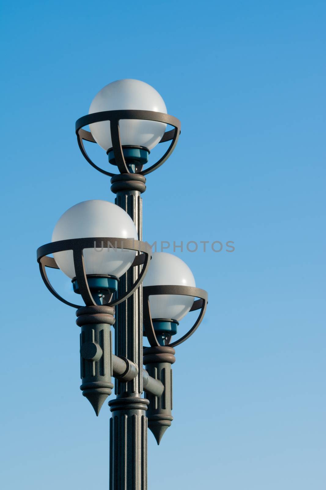 Light Post on Blue Sky by justtscott