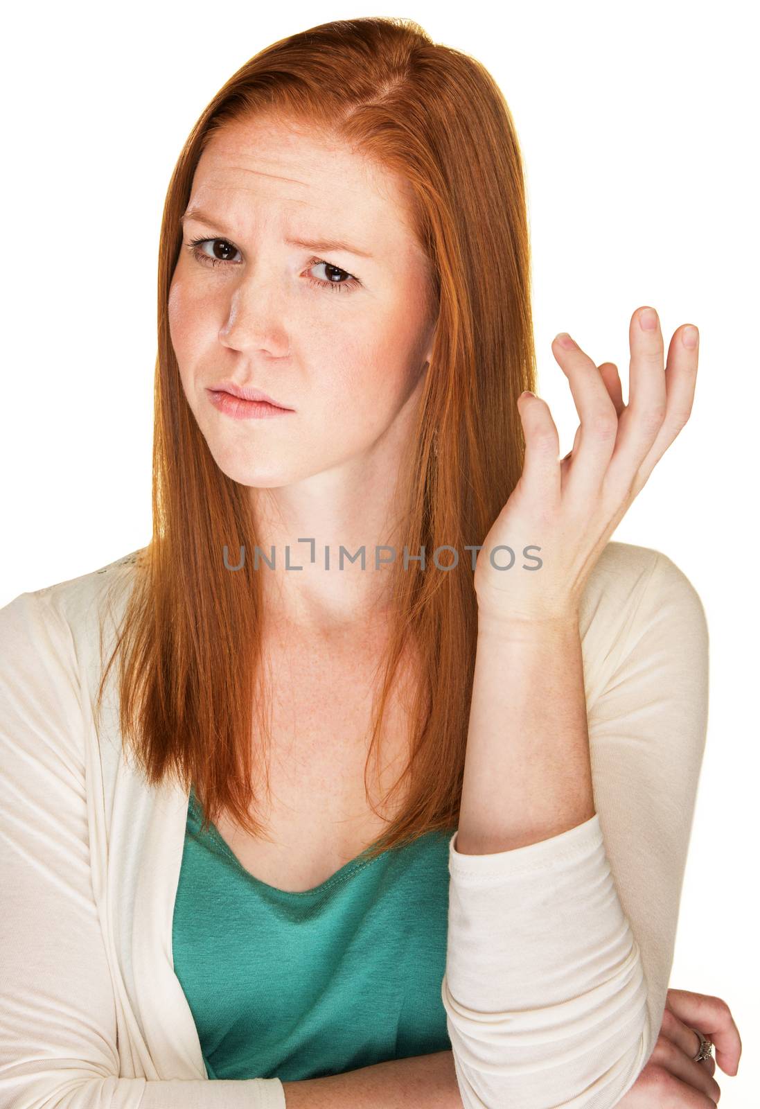Isolated frustrated young Caucasian female with red hair