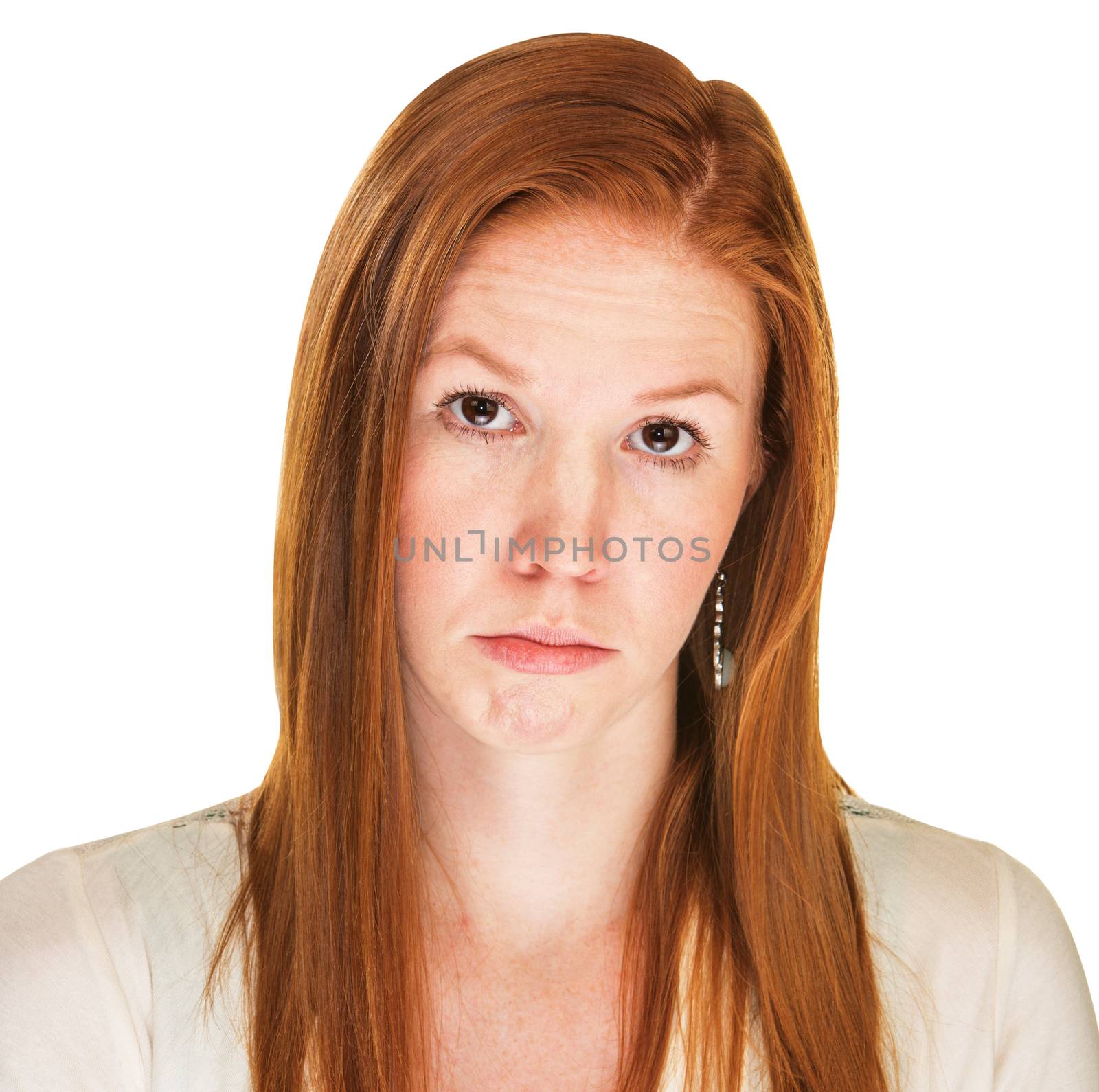 Isolated hopeless young Caucasian female with red hair