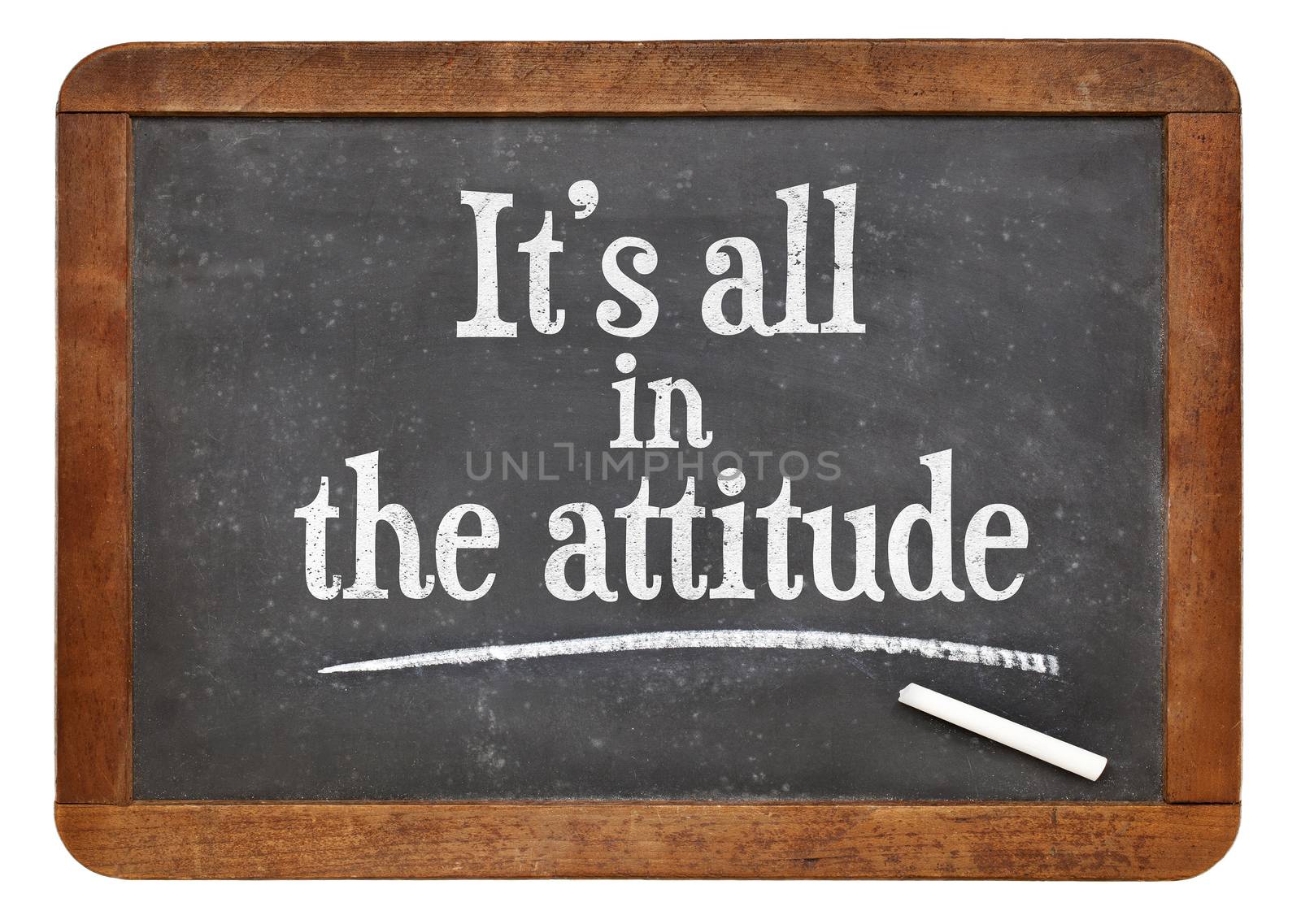 It is all in the attitude - motivational phrase  on a vintage slate blackboard